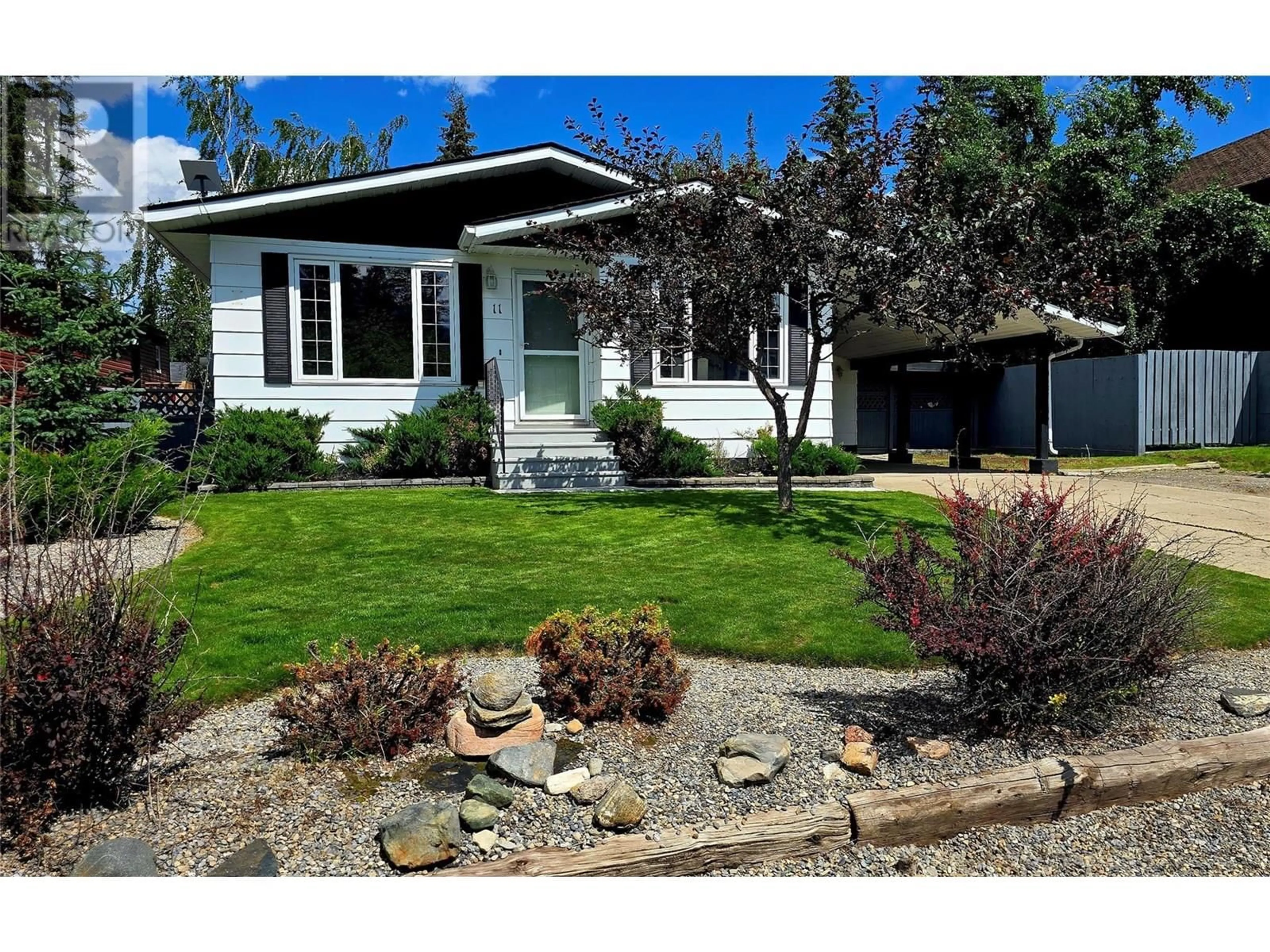 Home with vinyl exterior material, street for 11 CASCADE CRESCENT, Elkford British Columbia V0B1H0