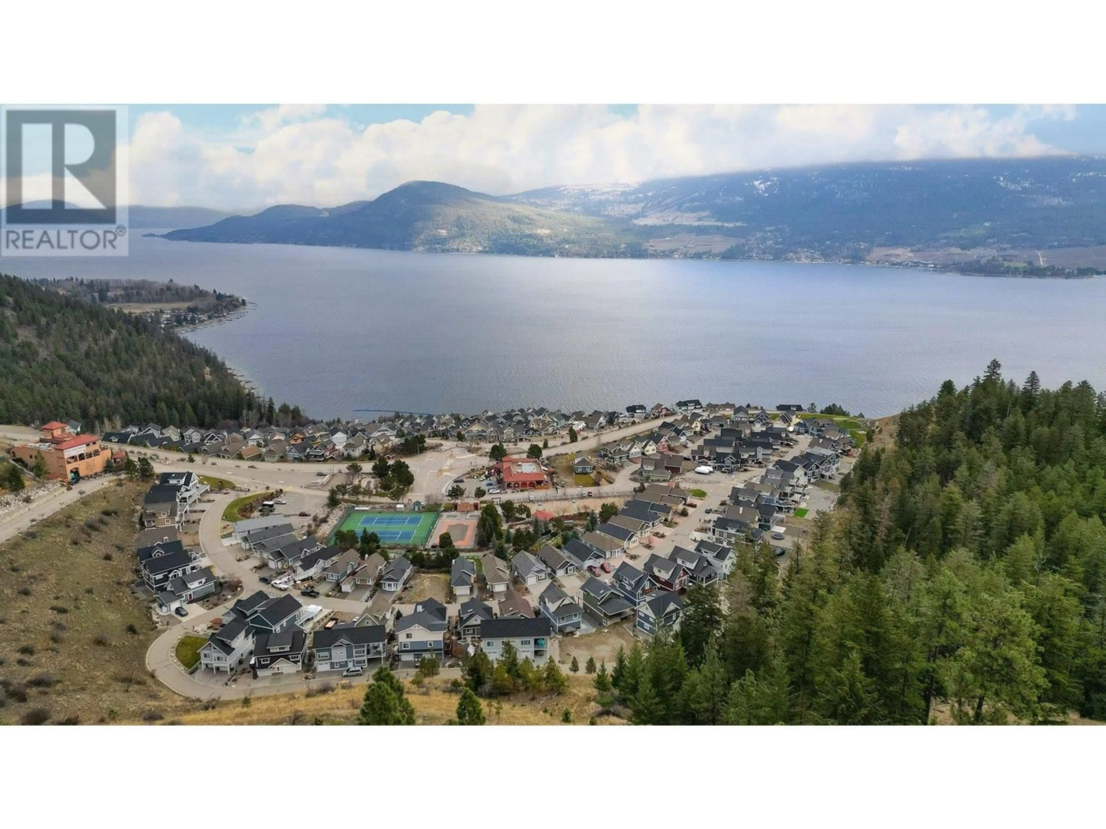 A pic from outside/outdoor area/front of a property/back of a property/a pic from drone, water/lake/river/ocean view for 6823 MADRID WAY, Kelowna British Columbia V1Z3R8