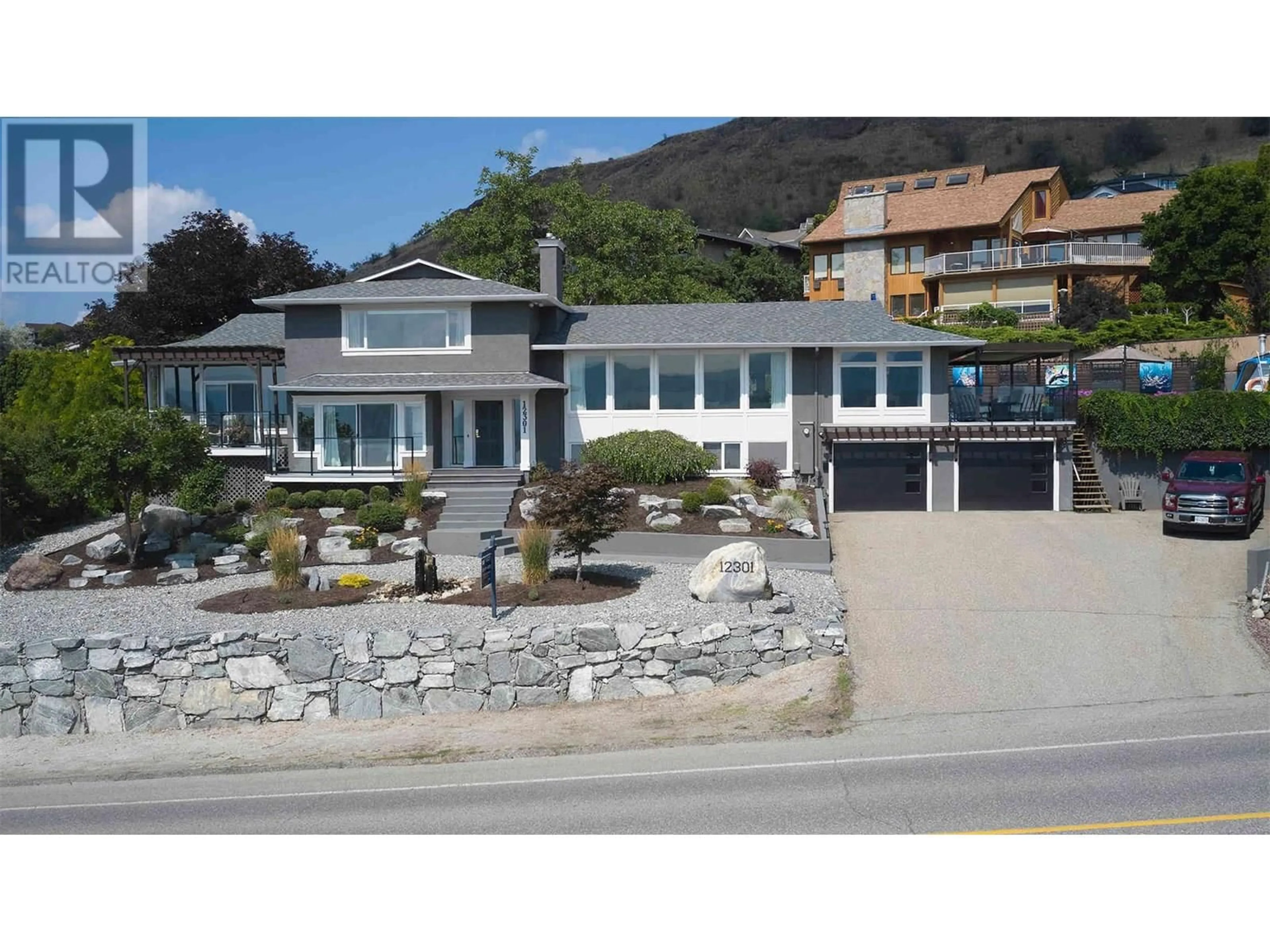 Home with vinyl exterior material, street for 12301 HUSBAND ROAD, Coldstream British Columbia V1B1N2