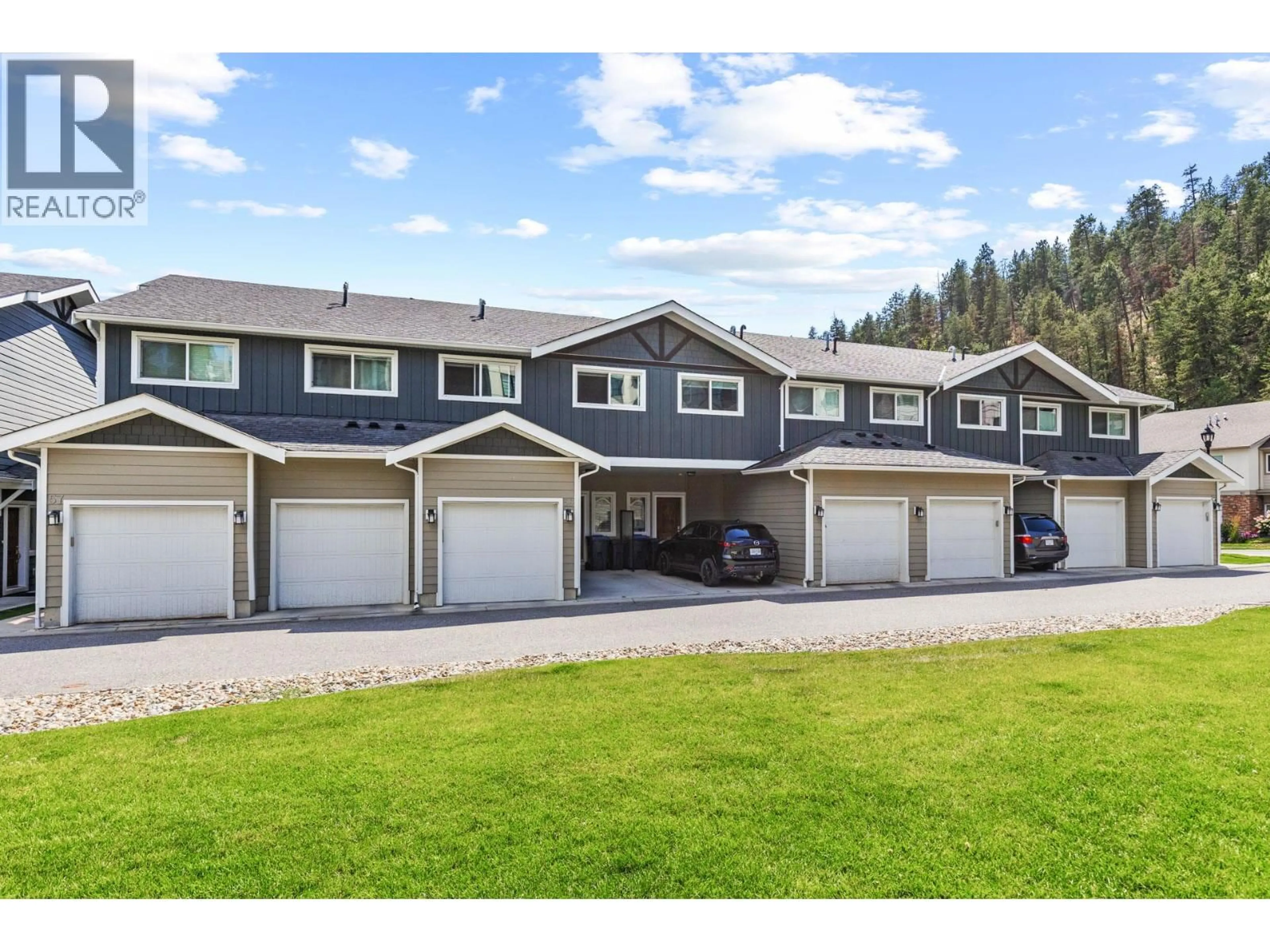 A pic from outside/outdoor area/front of a property/back of a property/a pic from drone, mountain view for 56 - 600 BOYNTON PLACE, Kelowna British Columbia V1V3B8