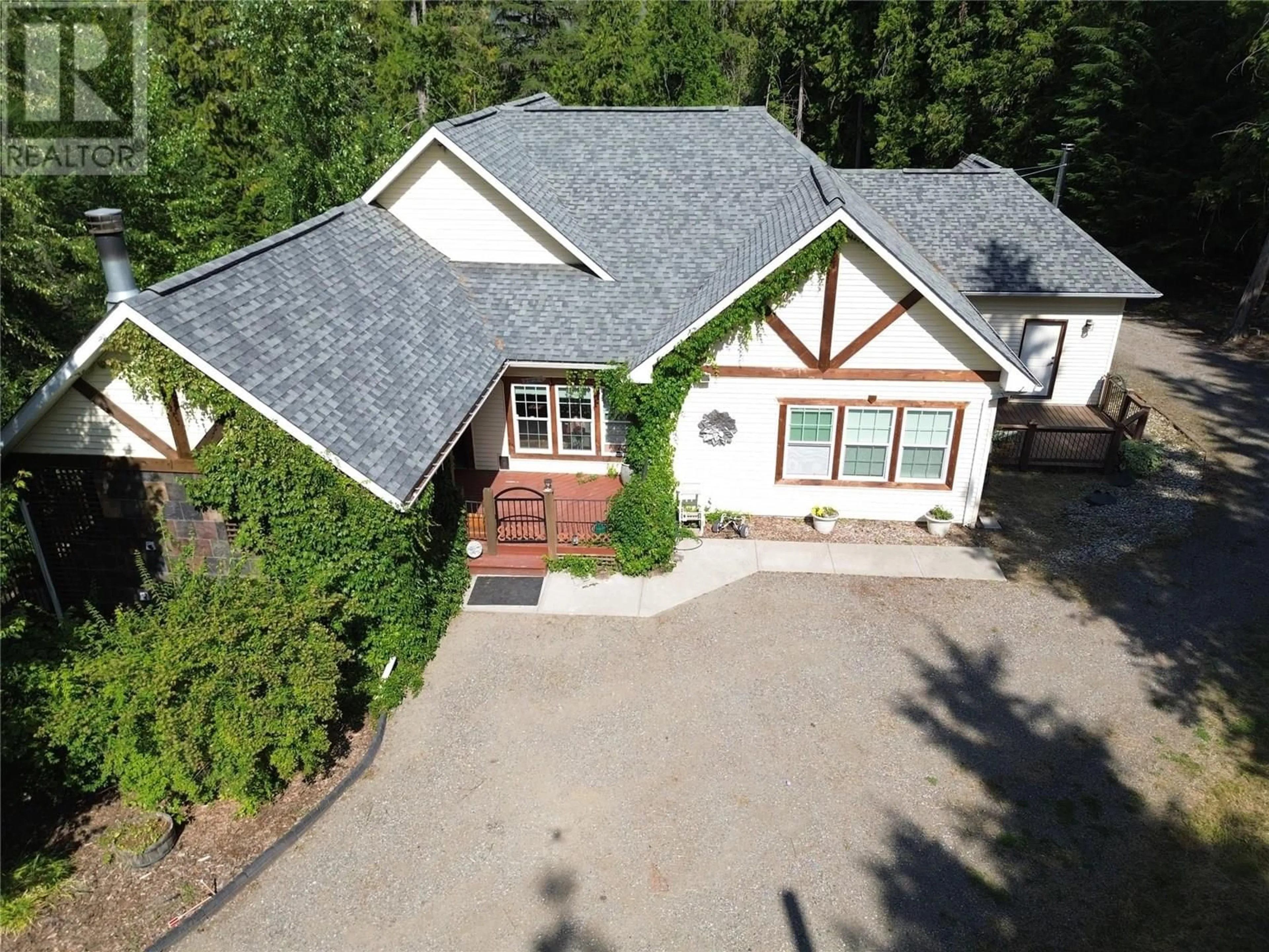 A pic from outside/outdoor area/front of a property/back of a property/a pic from drone, unknown for 1615 BEECH ROAD, Christina Lake British Columbia V0H1E0
