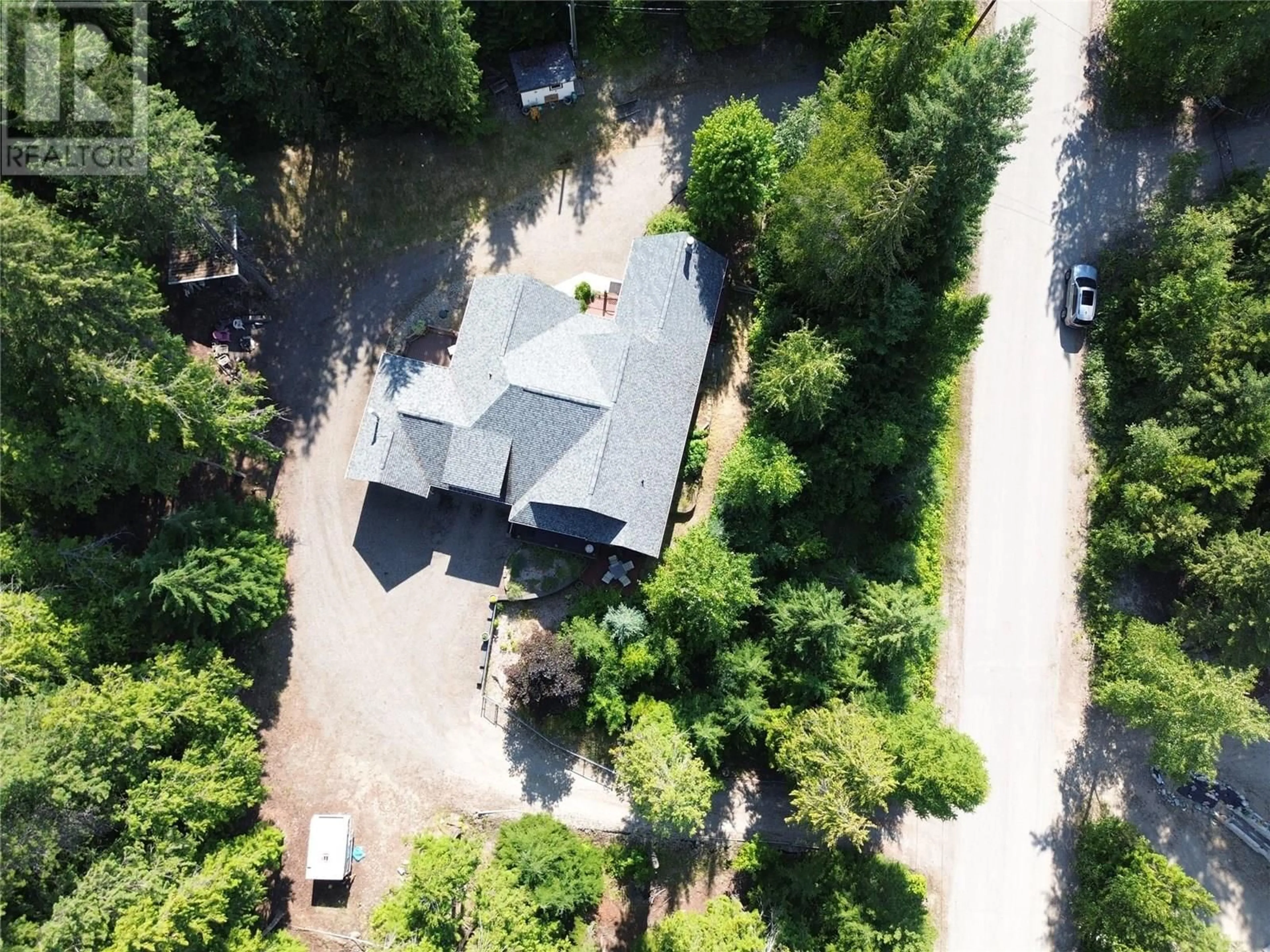A pic from outside/outdoor area/front of a property/back of a property/a pic from drone, unknown for 1615 BEECH ROAD, Christina Lake British Columbia V0H1E0