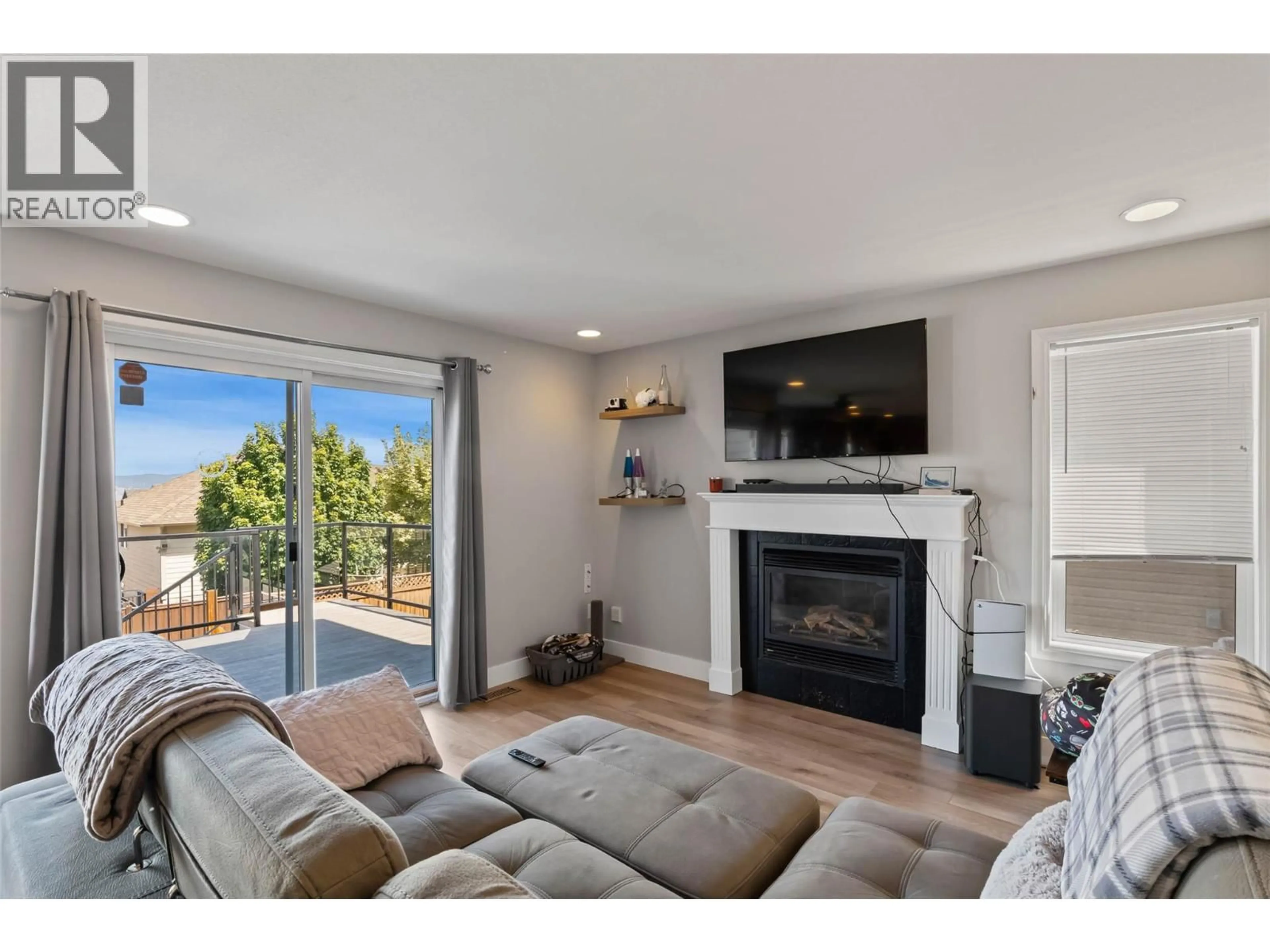 Living room with furniture, wood/laminate floor for 2608 BENTALL DRIVE, Kamloops British Columbia V1S2B5