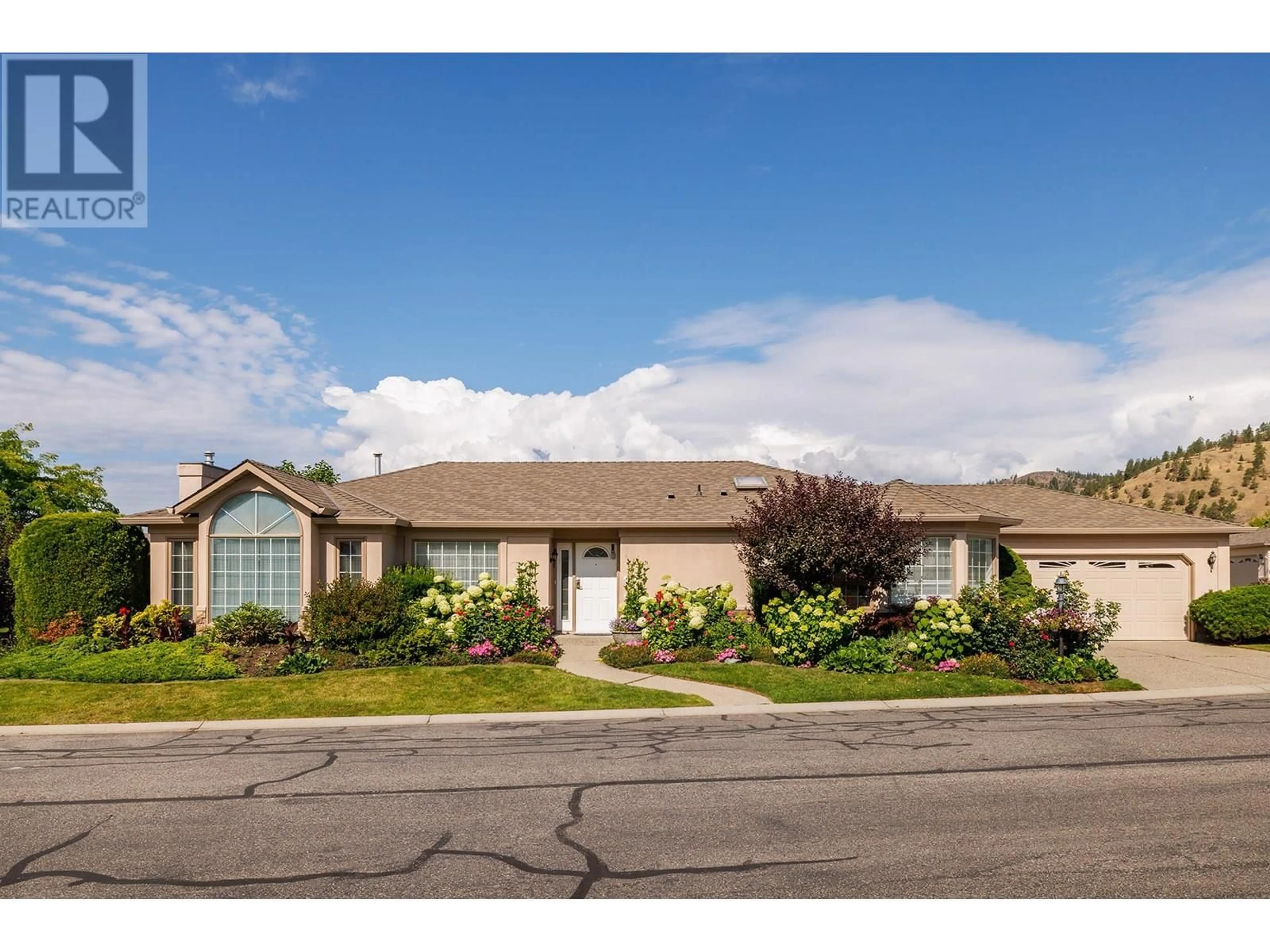 Home with vinyl exterior material, street for 56 - 595 YATES ROAD, Kelowna British Columbia V1V1P8