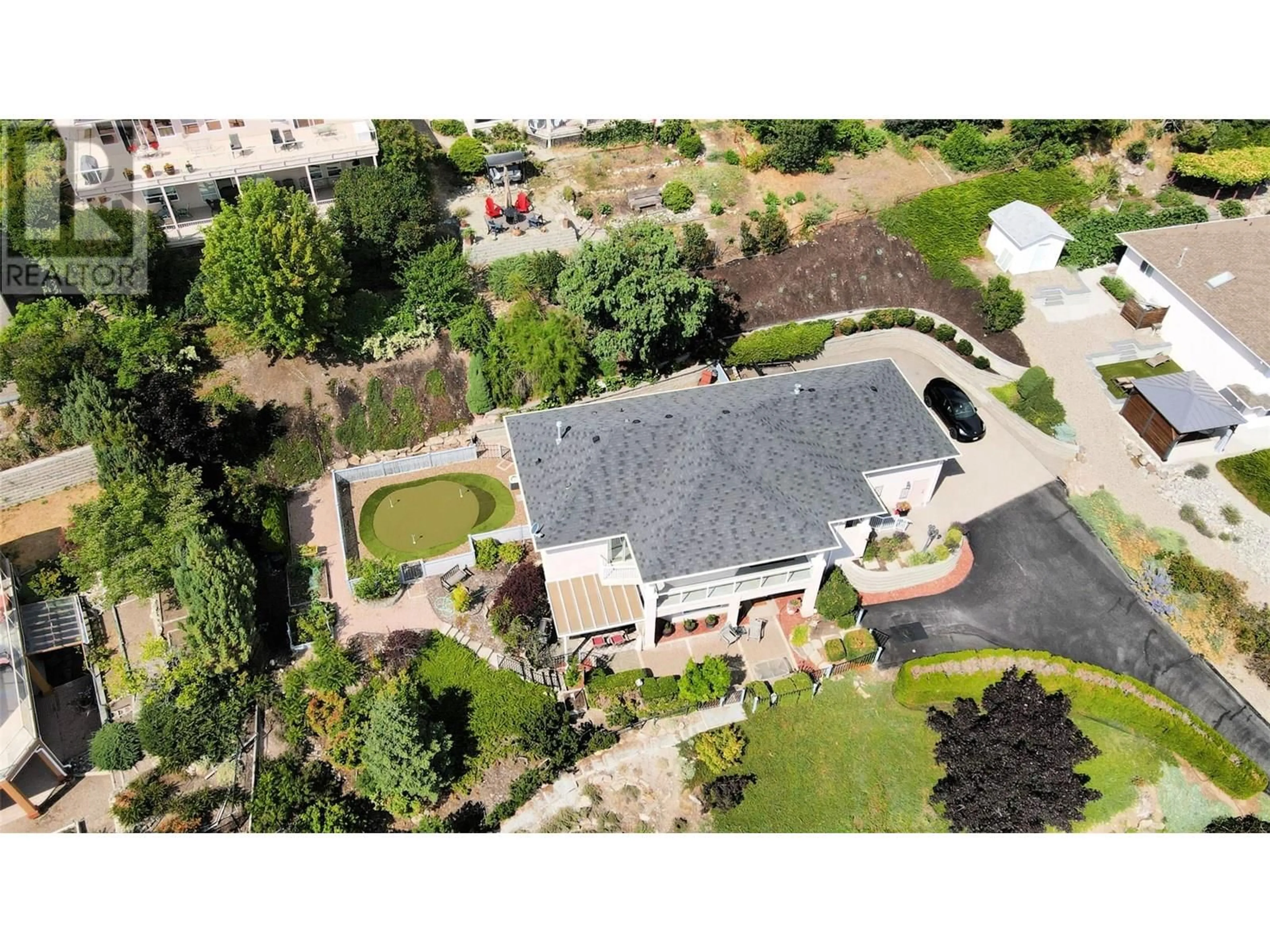 A pic from outside/outdoor area/front of a property/back of a property/a pic from drone, unknown for 5202 SUTHERLAND ROAD, Peachland British Columbia V0H1X2