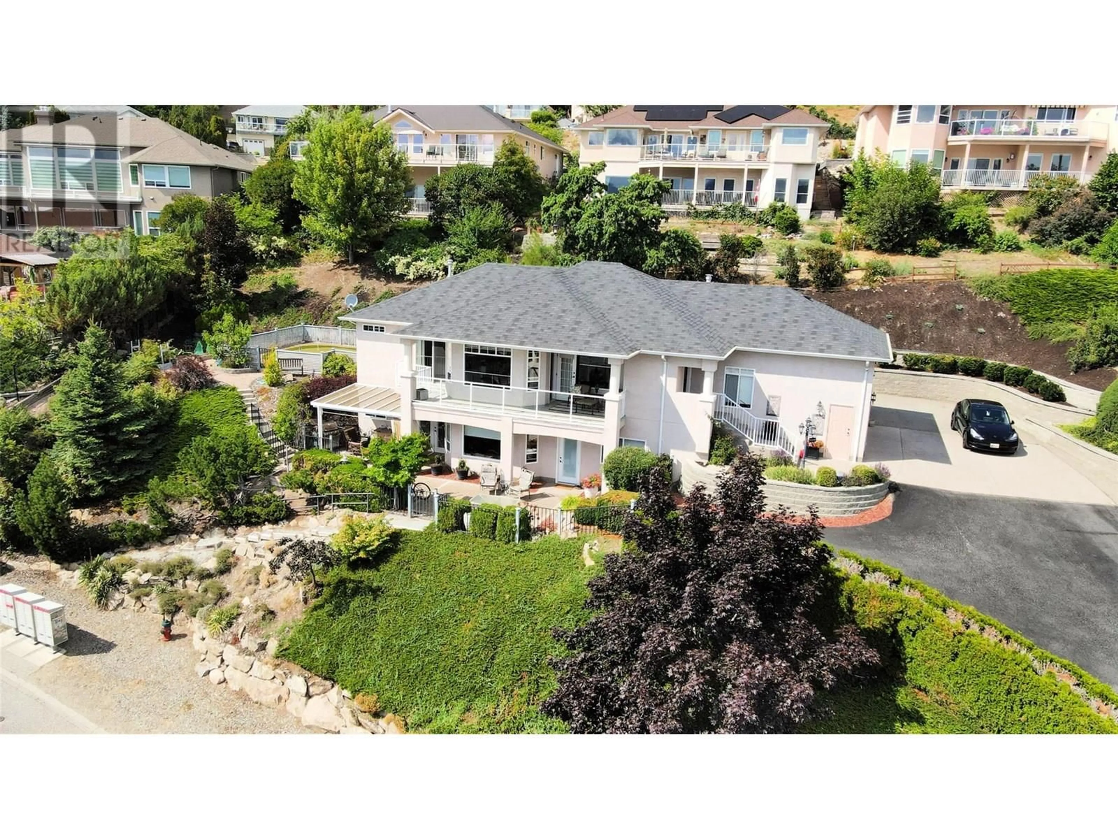 A pic from outside/outdoor area/front of a property/back of a property/a pic from drone, unknown for 5202 SUTHERLAND ROAD, Peachland British Columbia V0H1X2