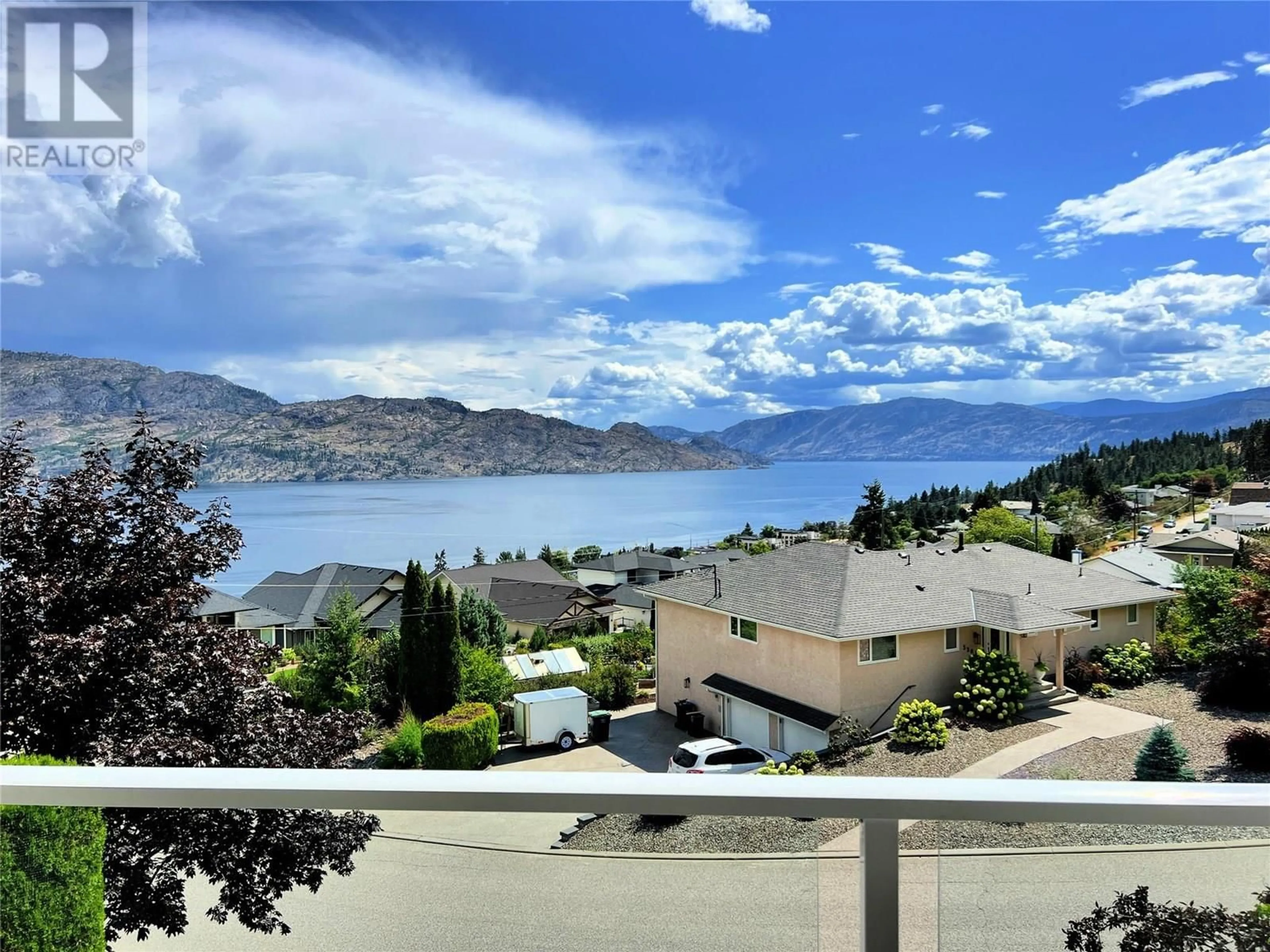 A pic from outside/outdoor area/front of a property/back of a property/a pic from drone, water/lake/river/ocean view for 5202 SUTHERLAND ROAD, Peachland British Columbia V0H1X2