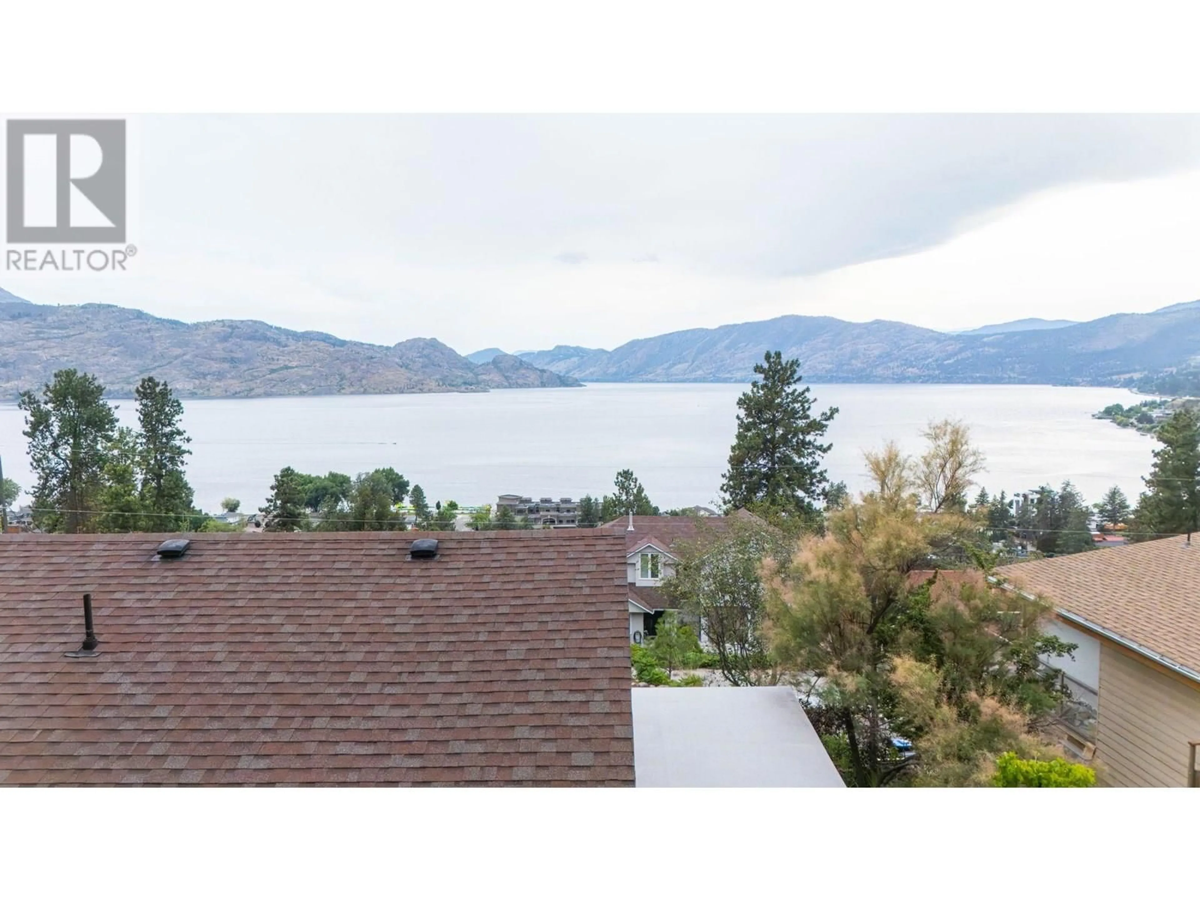 A pic from outside/outdoor area/front of a property/back of a property/a pic from drone, water/lake/river/ocean view for 4206 4TH AVENUE, Peachland British Columbia V0H1X5