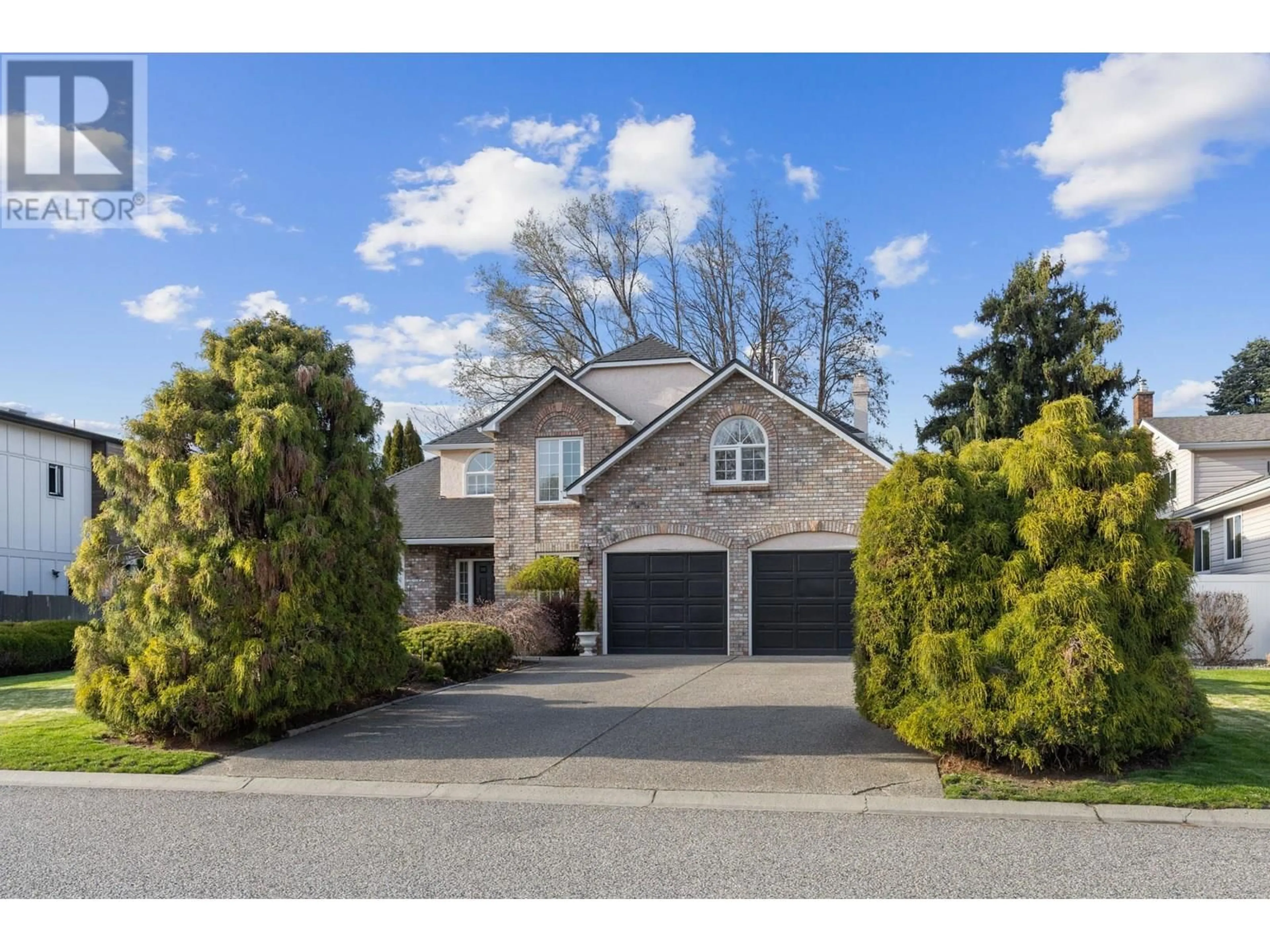 Home with brick exterior material, street for 636 WELKE ROAD, Kelowna British Columbia V1W1A7