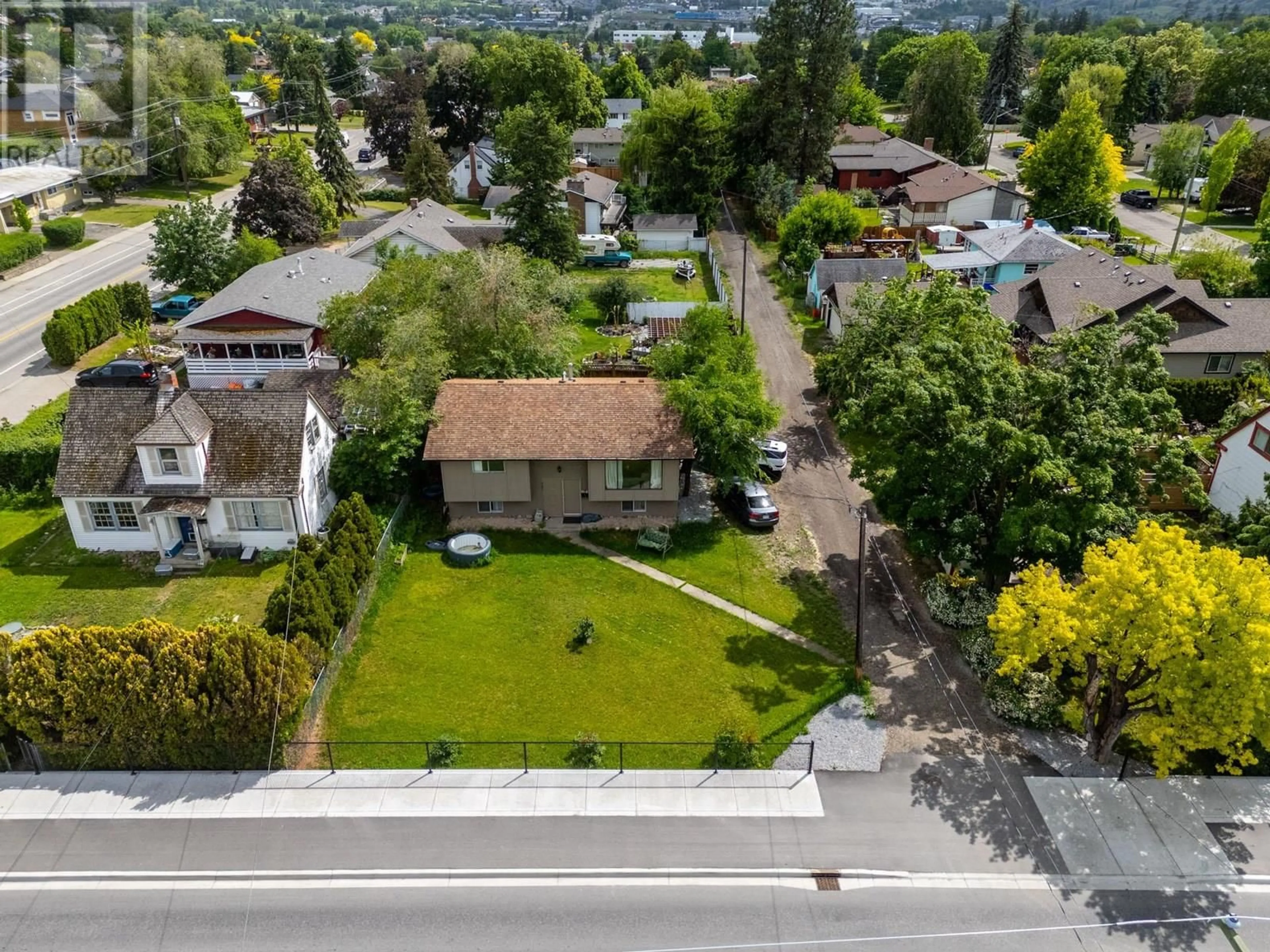 A pic from outside/outdoor area/front of a property/back of a property/a pic from drone, street for 1502 32 AVENUE, Vernon British Columbia V1T2H8
