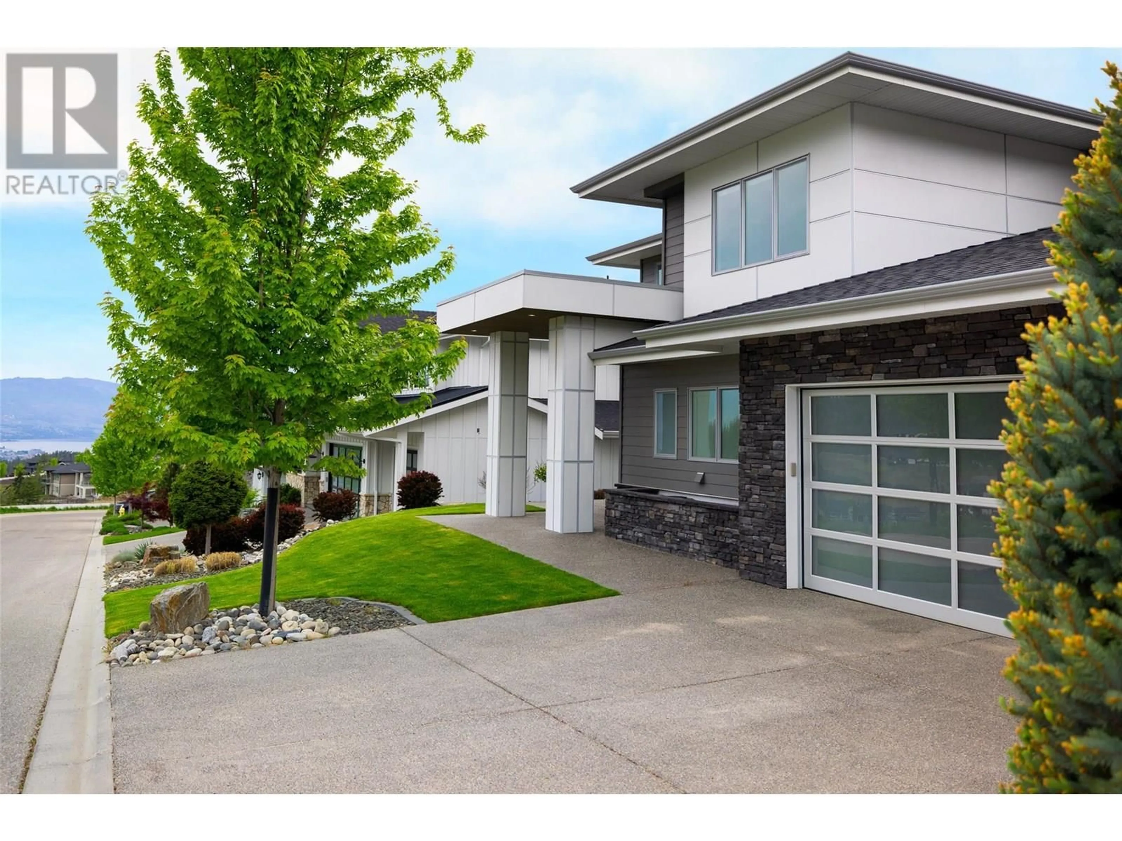 Home with vinyl exterior material, street for 78 RED SKY COURT, Kelowna British Columbia V1V3G4