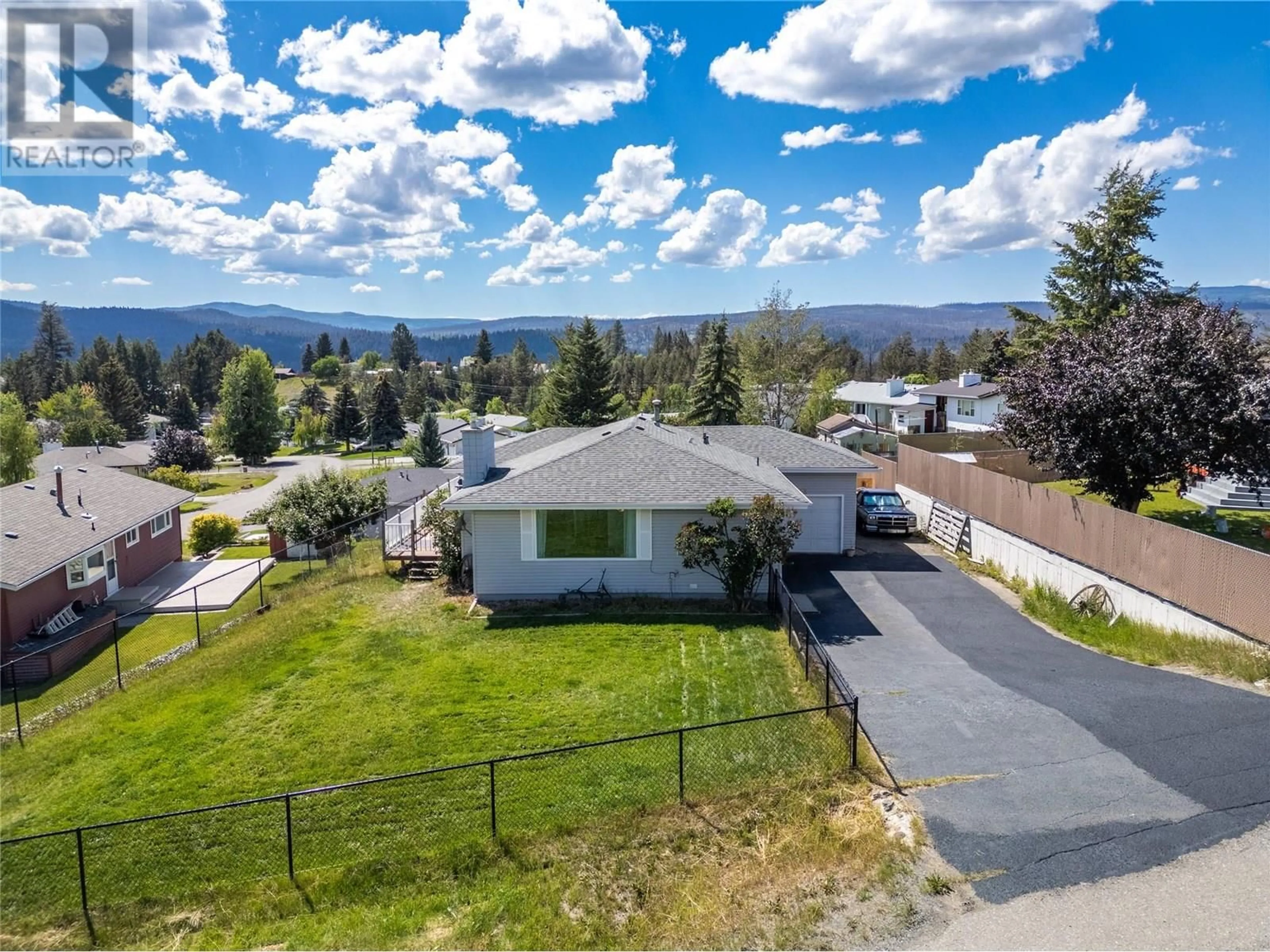 A pic from outside/outdoor area/front of a property/back of a property/a pic from drone, mountain view for 12 EMERALD DRIVE, Logan Lake British Columbia V0K1W0