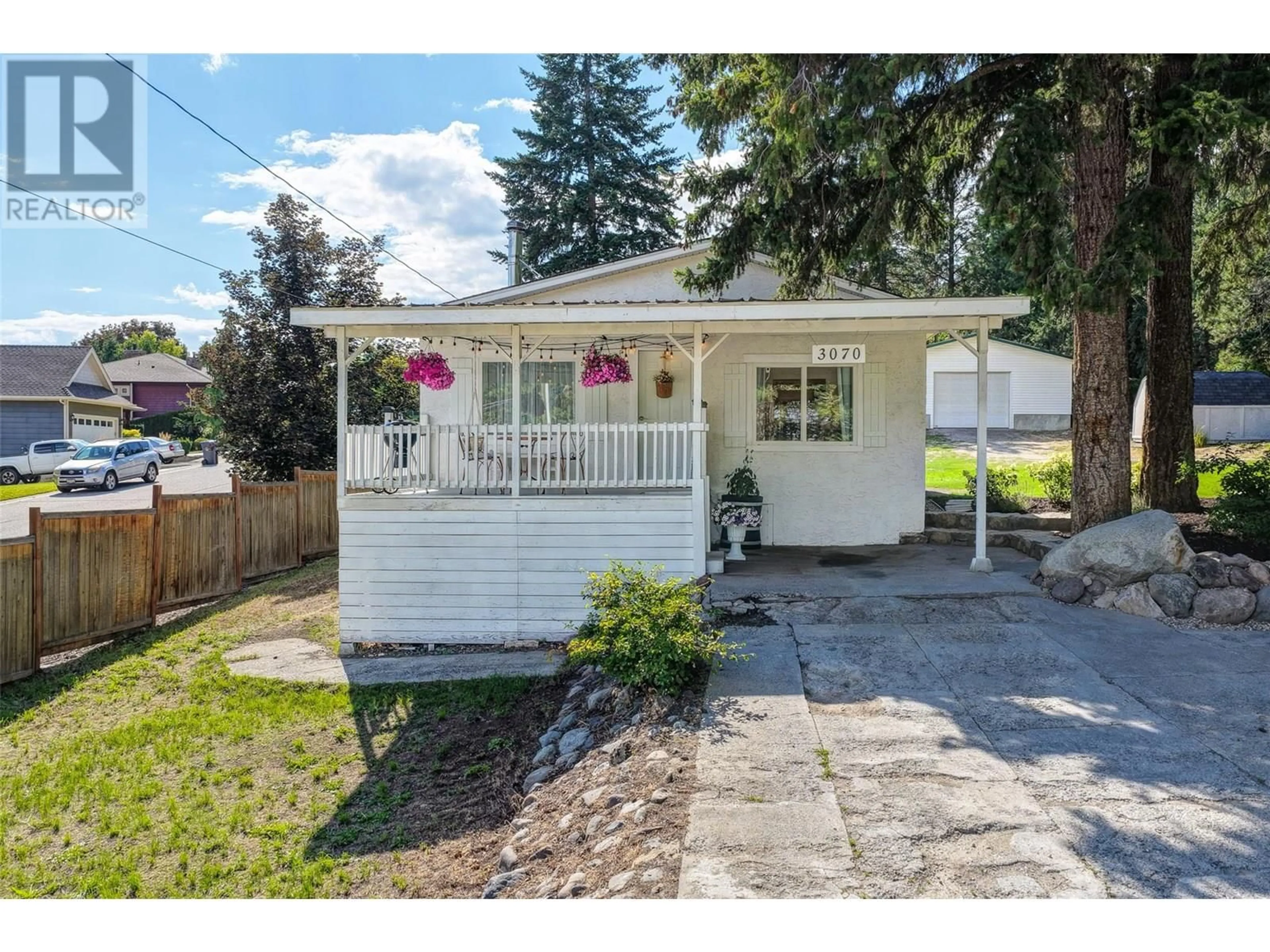 Home with vinyl exterior material, street for 3070 SMITH CREEK ROAD, West Kelowna British Columbia V2T1M8