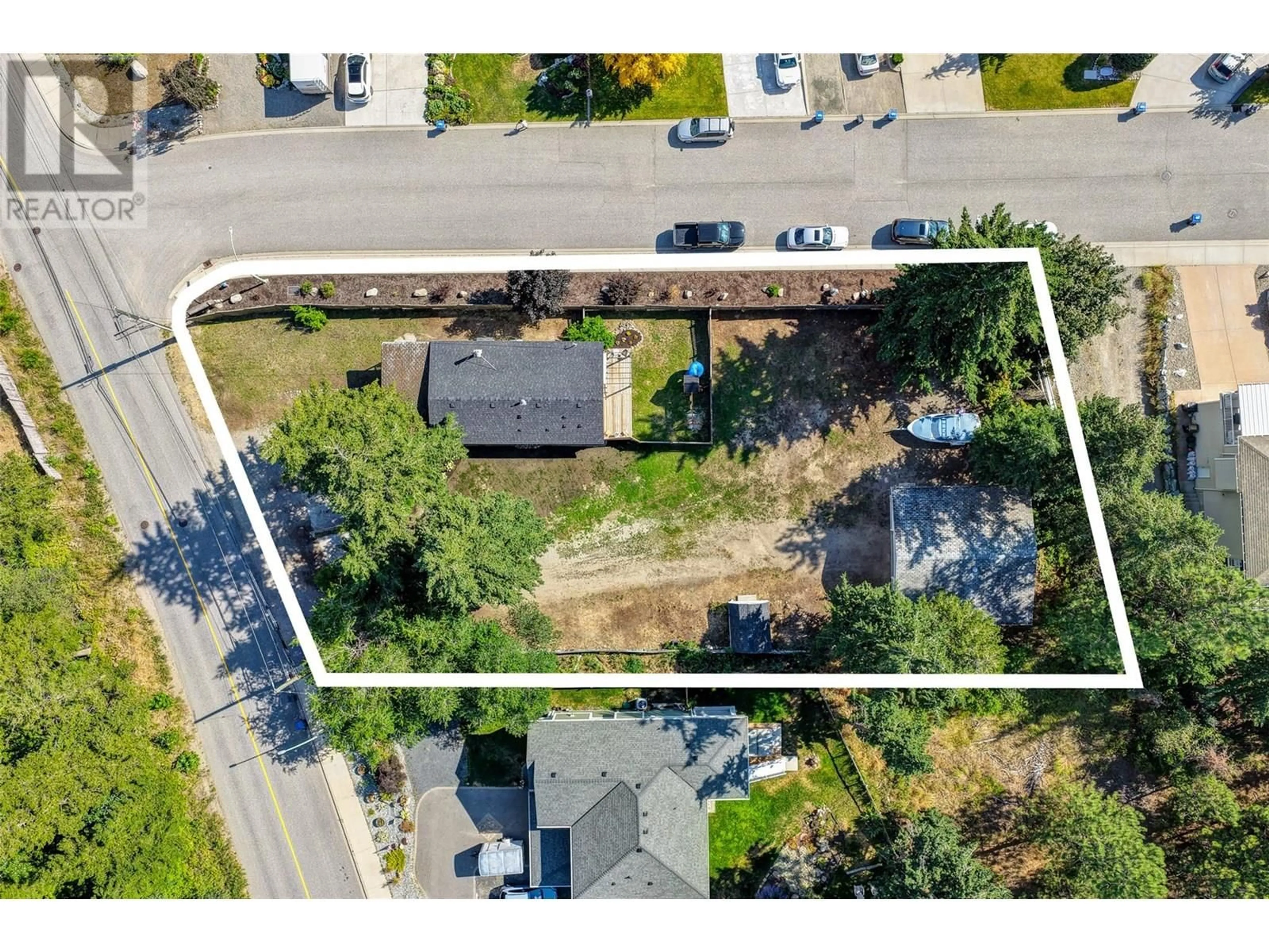 A pic from outside/outdoor area/front of a property/back of a property/a pic from drone, street for 3070 SMITH CREEK ROAD, West Kelowna British Columbia V2T1M8