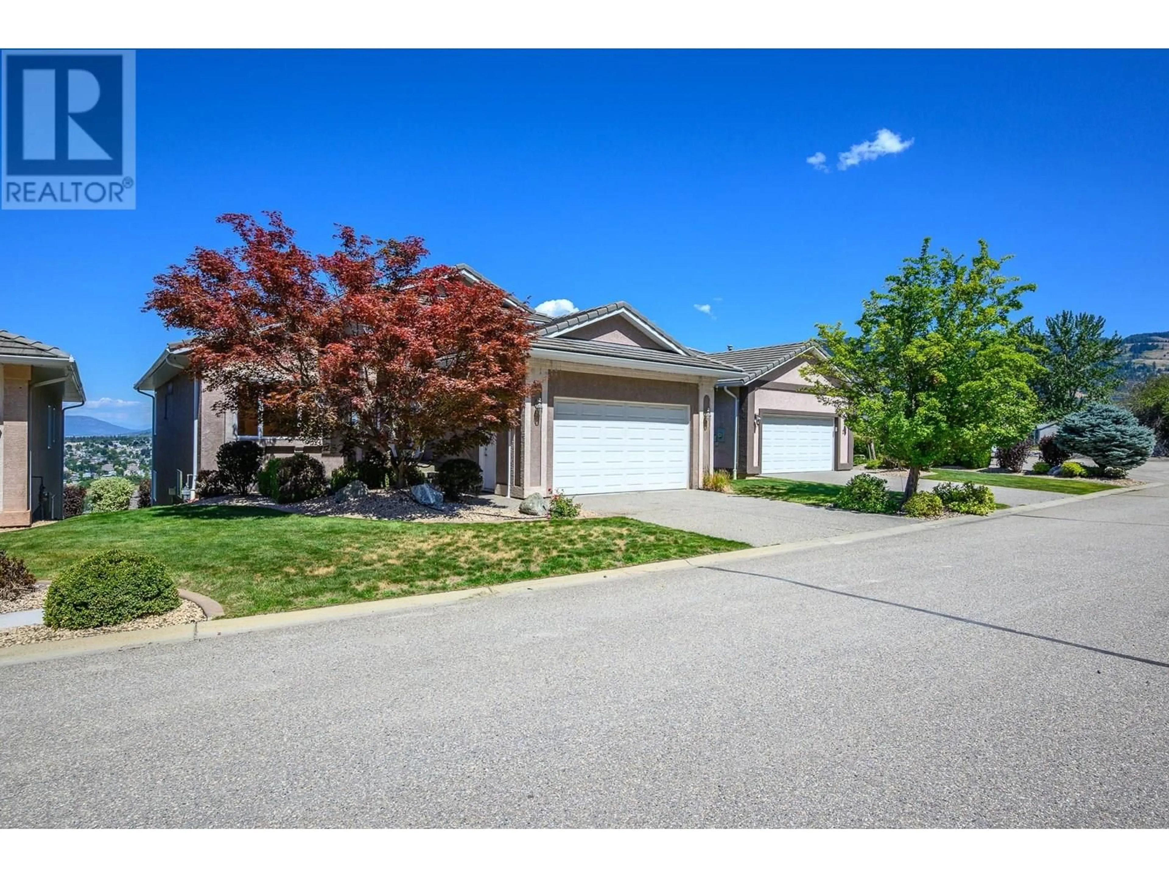 A pic from outside/outdoor area/front of a property/back of a property/a pic from drone, street for 23 QUAIL VISTA PLACE, Vernon British Columbia V1B3X9