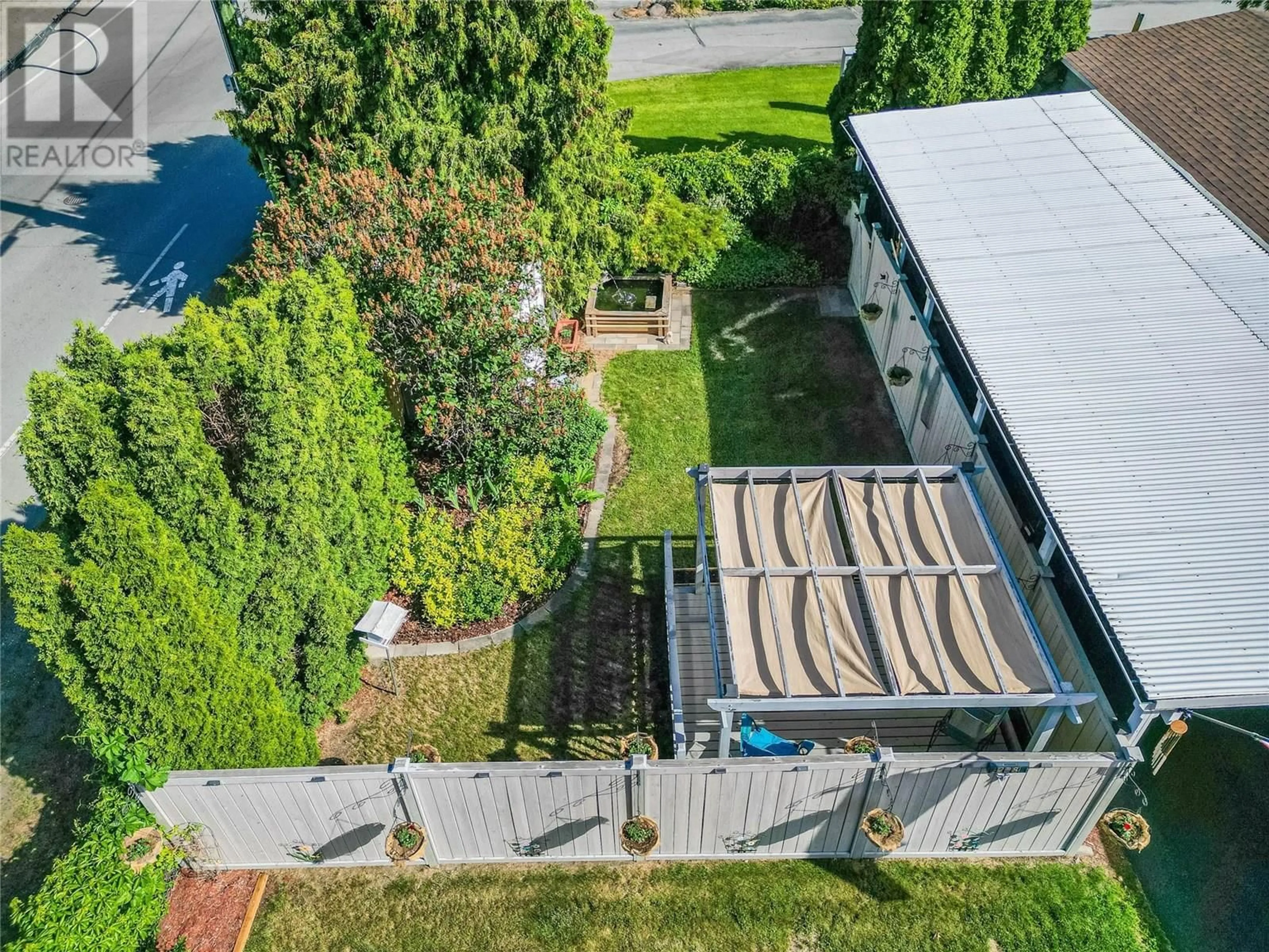 A pic from outside/outdoor area/front of a property/back of a property/a pic from drone, city buildings view from balcony for 228 - 2400 OAKDALE WAY, Kamloops British Columbia V2B6W7