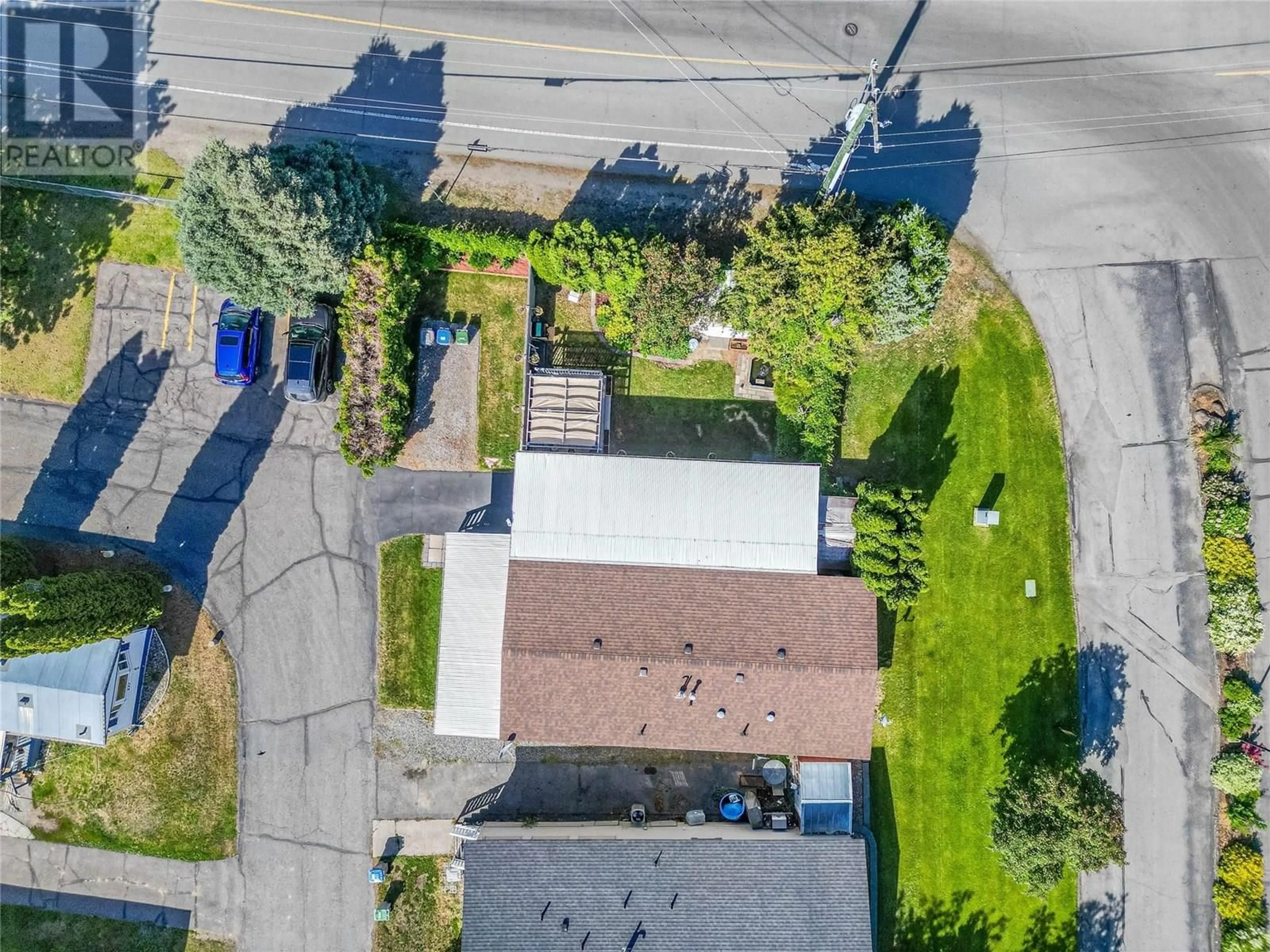 A pic from outside/outdoor area/front of a property/back of a property/a pic from drone, street for 228 - 2400 OAKDALE WAY, Kamloops British Columbia V2B6W7