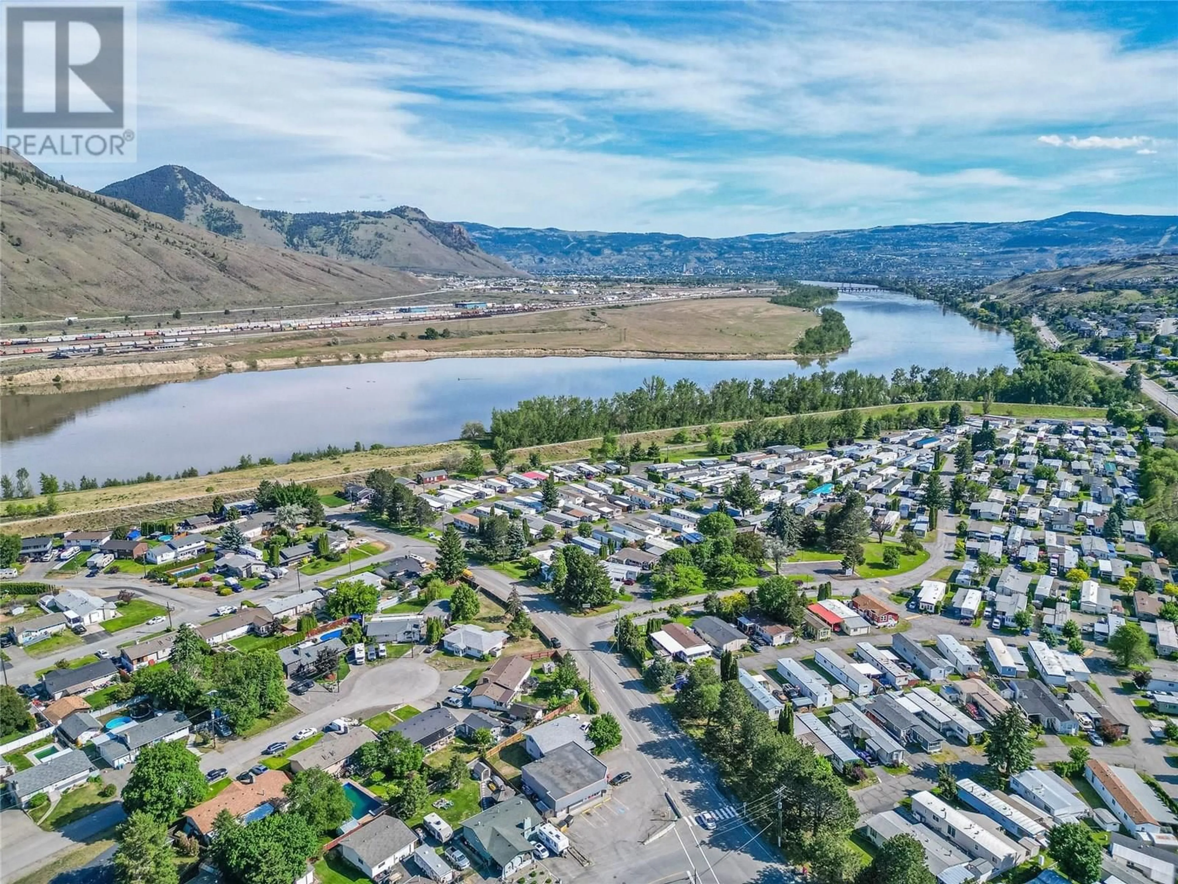 A pic from outside/outdoor area/front of a property/back of a property/a pic from drone, water/lake/river/ocean view for 228 - 2400 OAKDALE WAY, Kamloops British Columbia V2B6W7