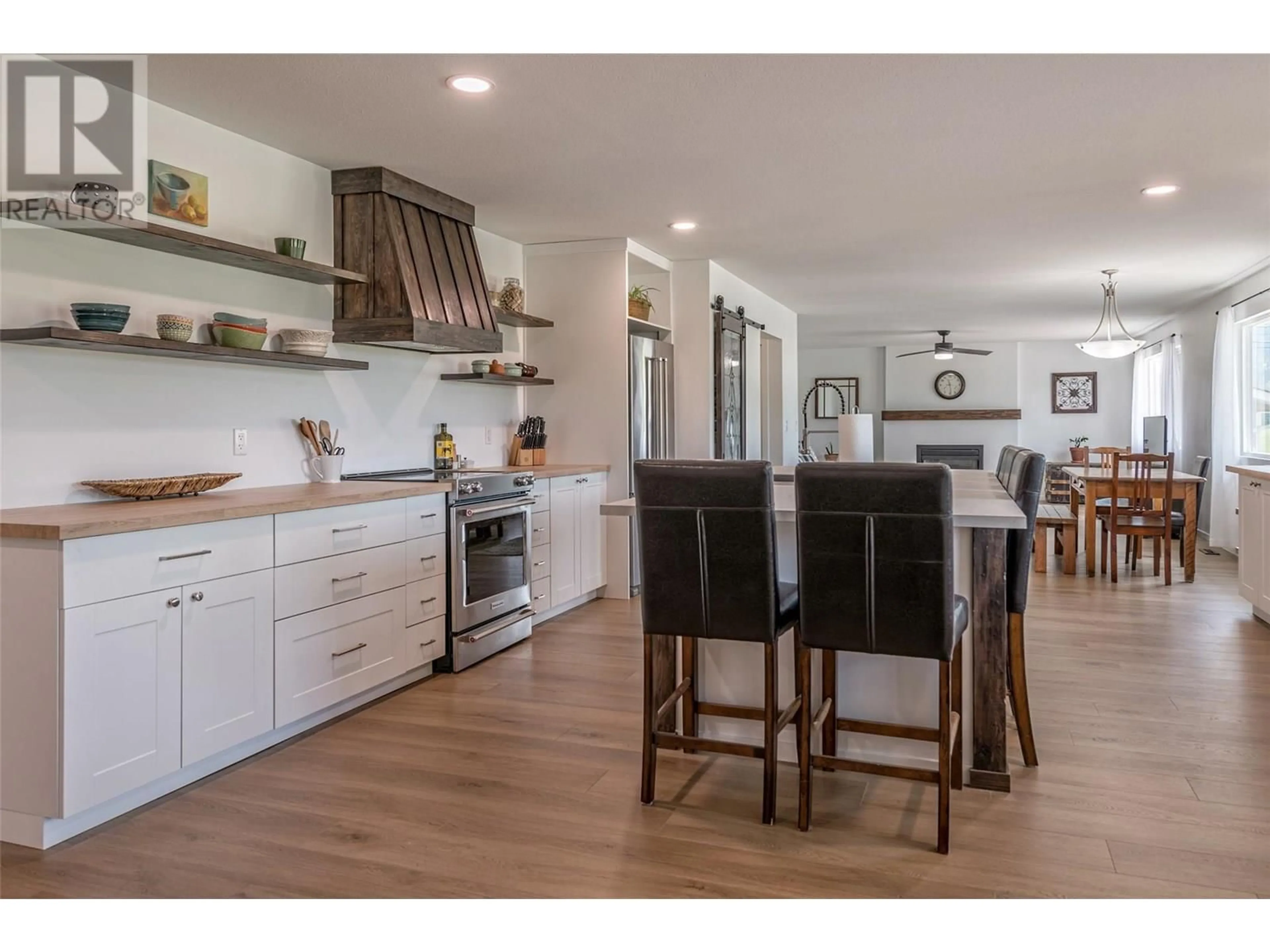 Open concept kitchen, wood/laminate floor for 3470 COLONY AVENUE, Armstrong British Columbia V0E1B2