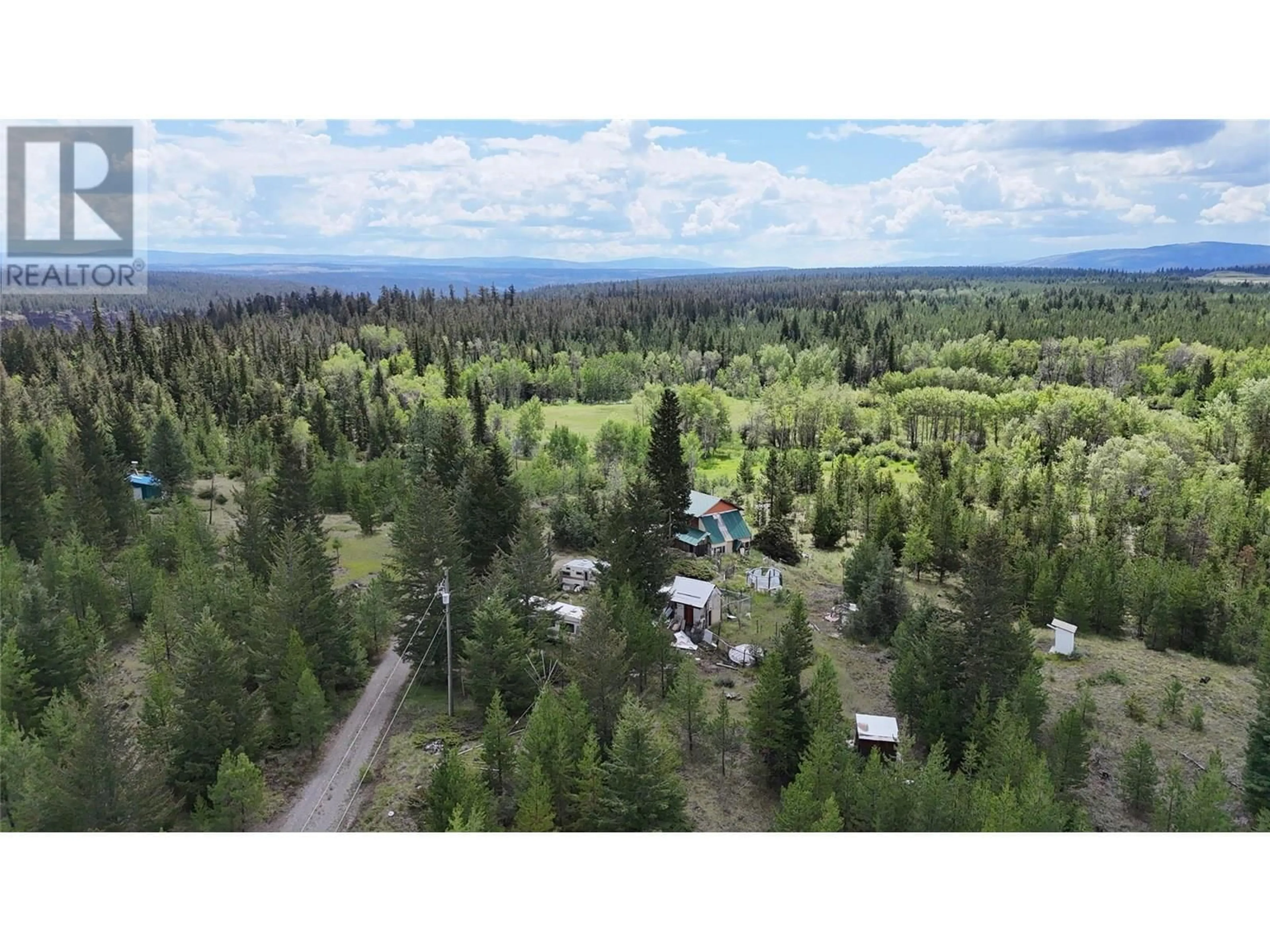 A pic from outside/outdoor area/front of a property/back of a property/a pic from drone, forest/trees view for 1400 CHASM ROAD, 70 Mile House British Columbia V0K1K0