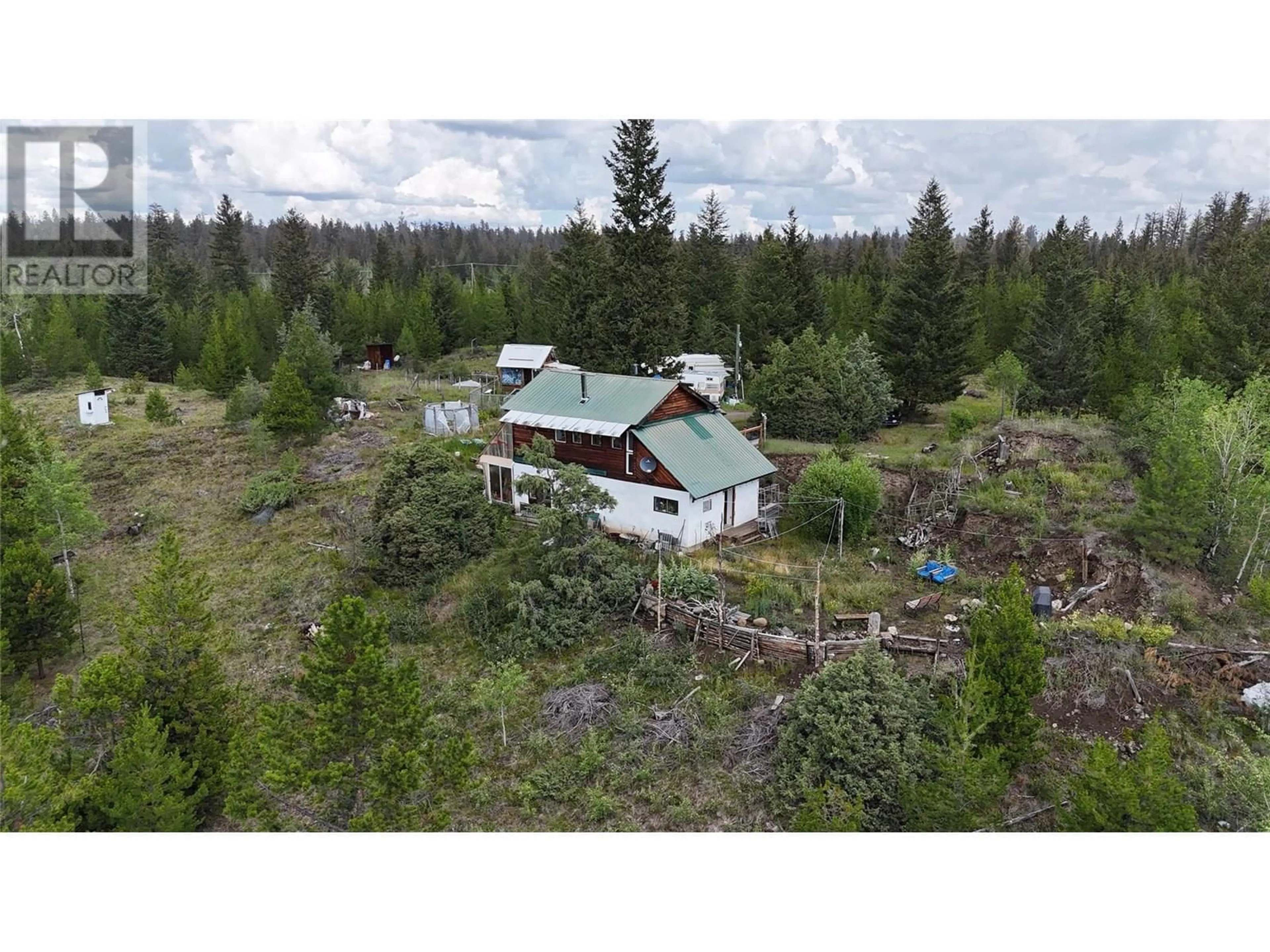 A pic from outside/outdoor area/front of a property/back of a property/a pic from drone, forest/trees view for 1400 CHASM ROAD, 70 Mile House British Columbia V0K1K0