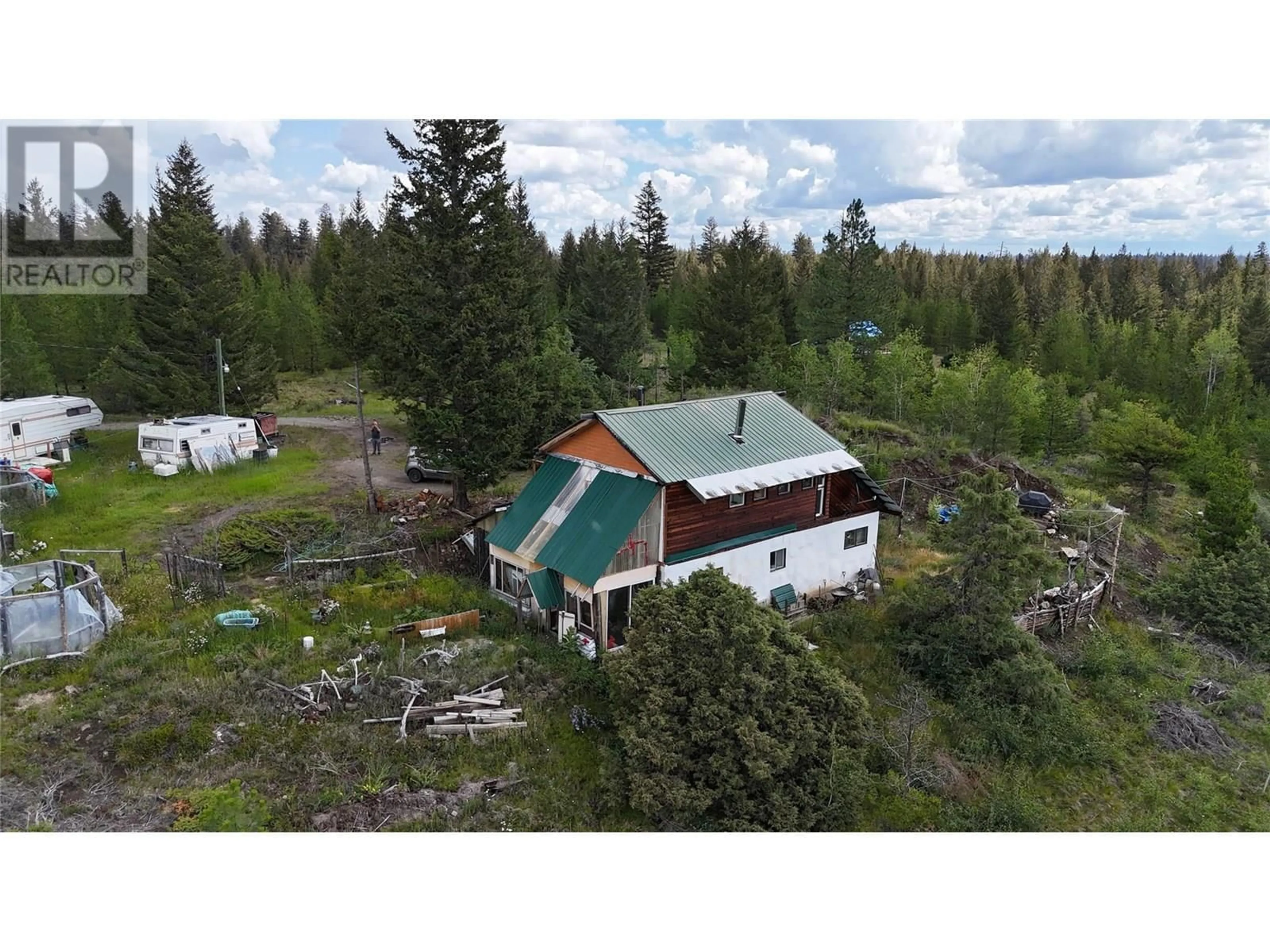 A pic from outside/outdoor area/front of a property/back of a property/a pic from drone, unknown for 1400 CHASM ROAD, 70 Mile House British Columbia V0K1K0