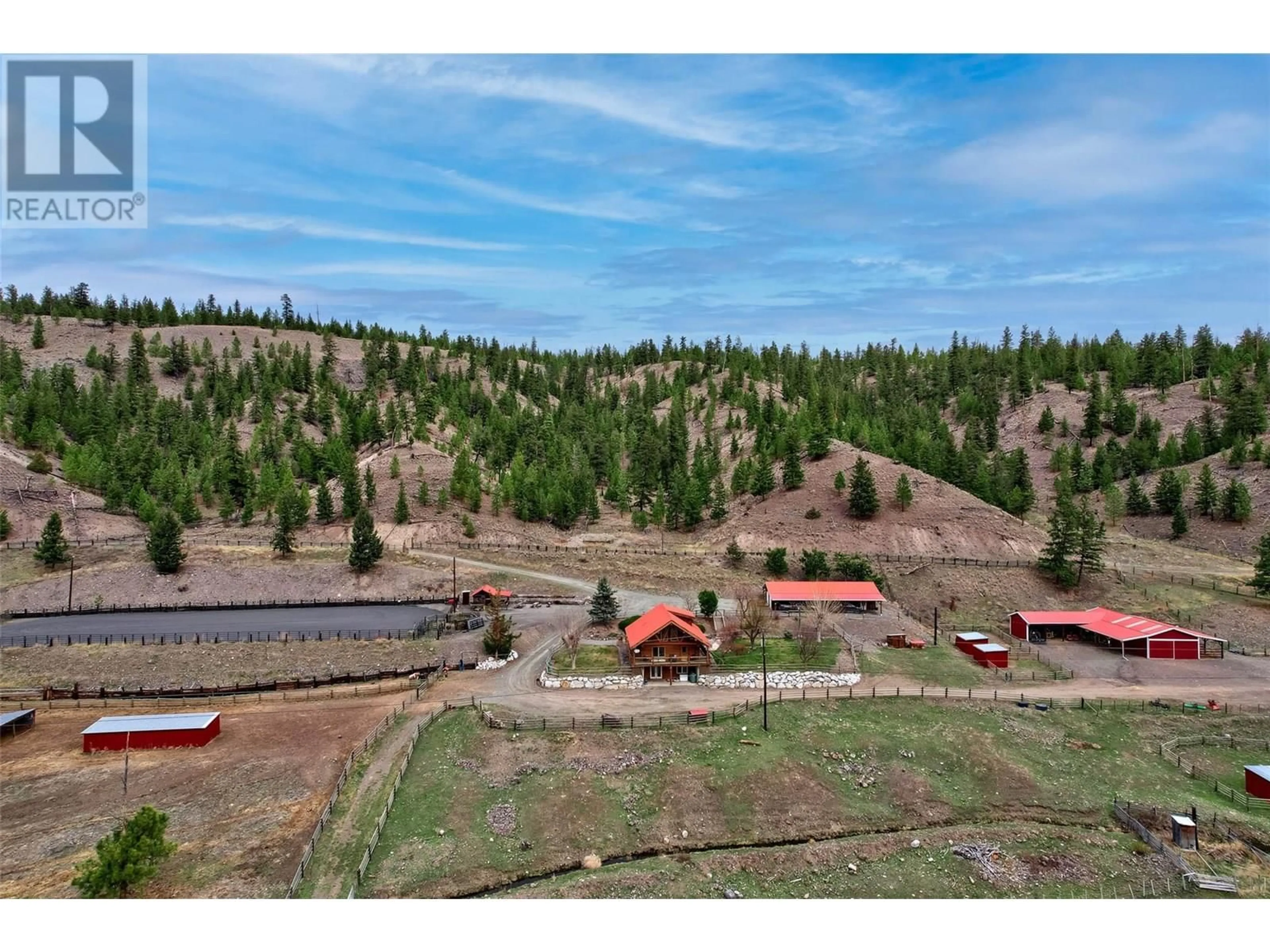 A pic from outside/outdoor area/front of a property/back of a property/a pic from drone, mountain view for 1190 TOMLIN ROAD, Cache Creek British Columbia V0K1H1