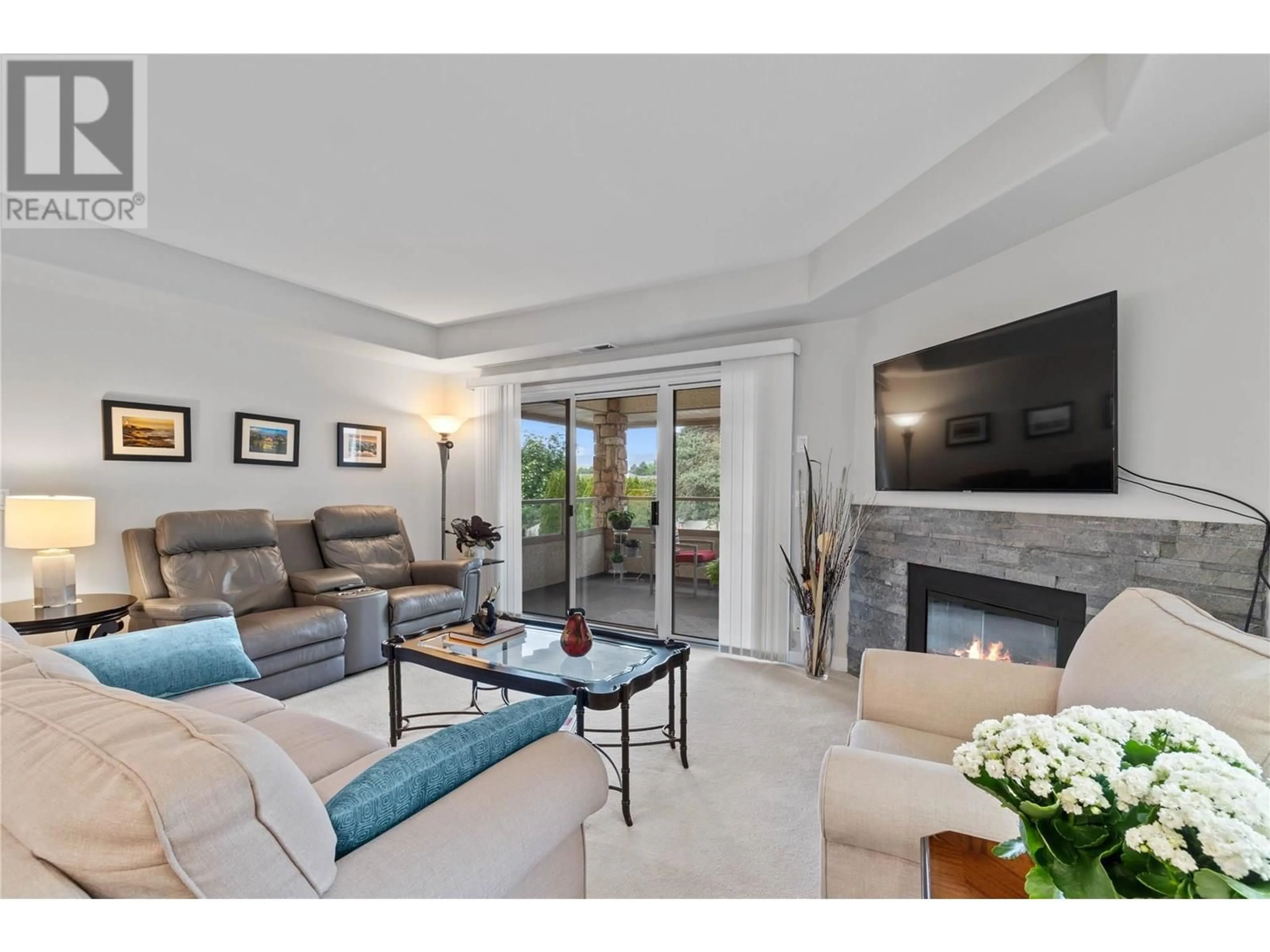Living room with furniture, unknown for 213 - 3335 RICHTER STREET, Kelowna British Columbia V1W3Y1