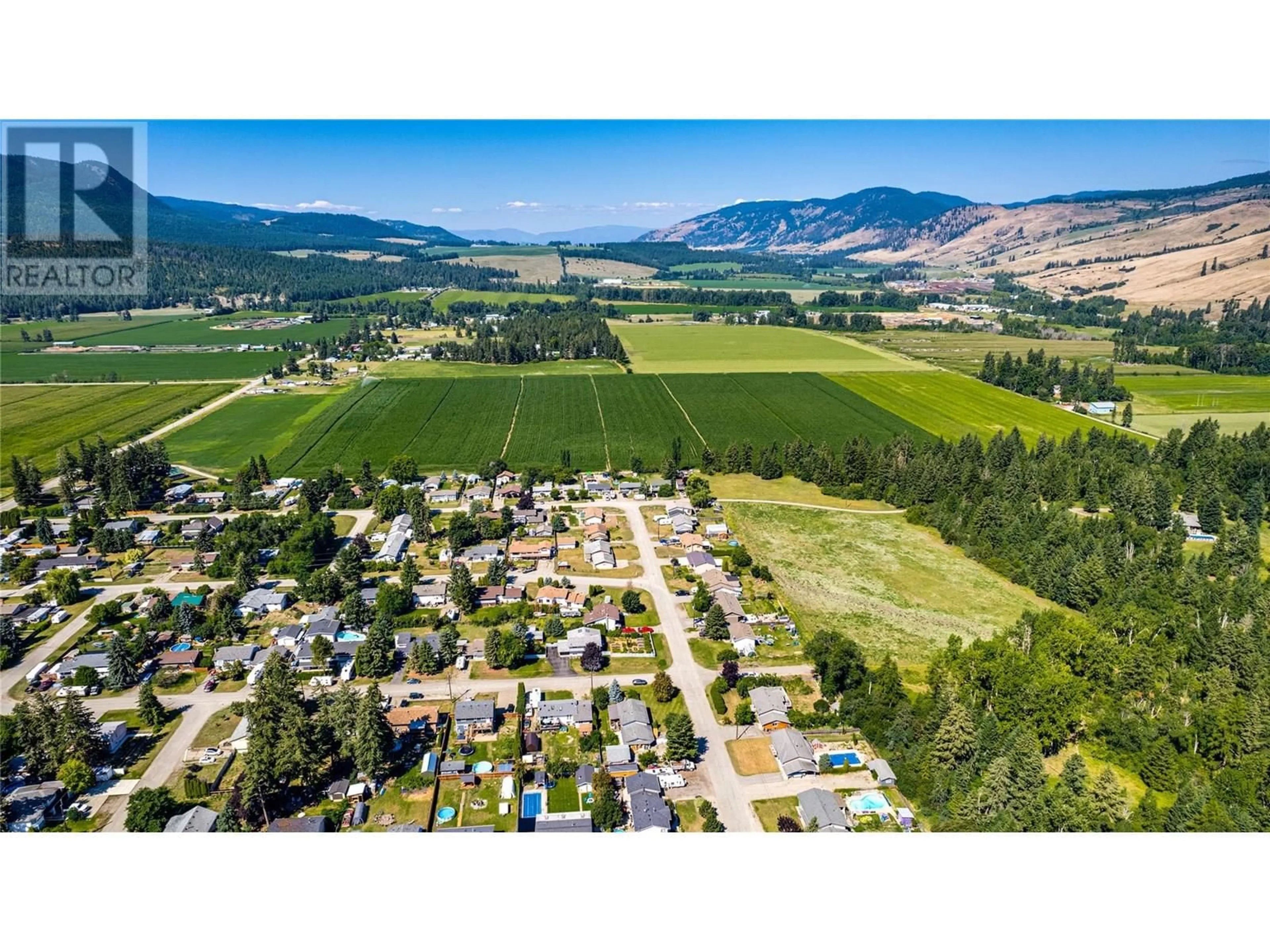 A pic from outside/outdoor area/front of a property/back of a property/a pic from drone, mountain view for 798 ARBUTUS ROAD, Lumby British Columbia V0E2G7