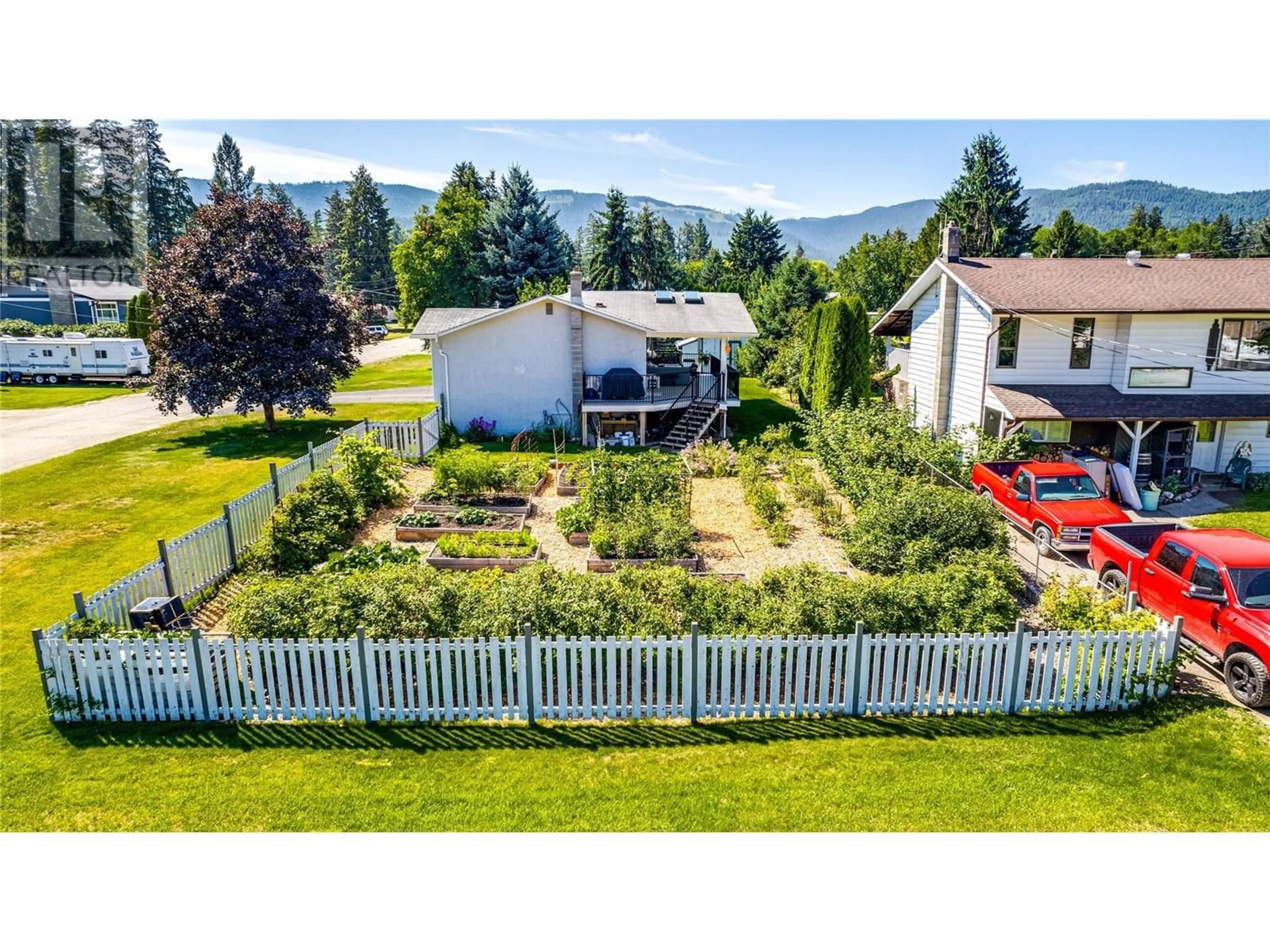 A pic from outside/outdoor area/front of a property/back of a property/a pic from drone, mountain view for 798 ARBUTUS ROAD, Lumby British Columbia V0E2G7