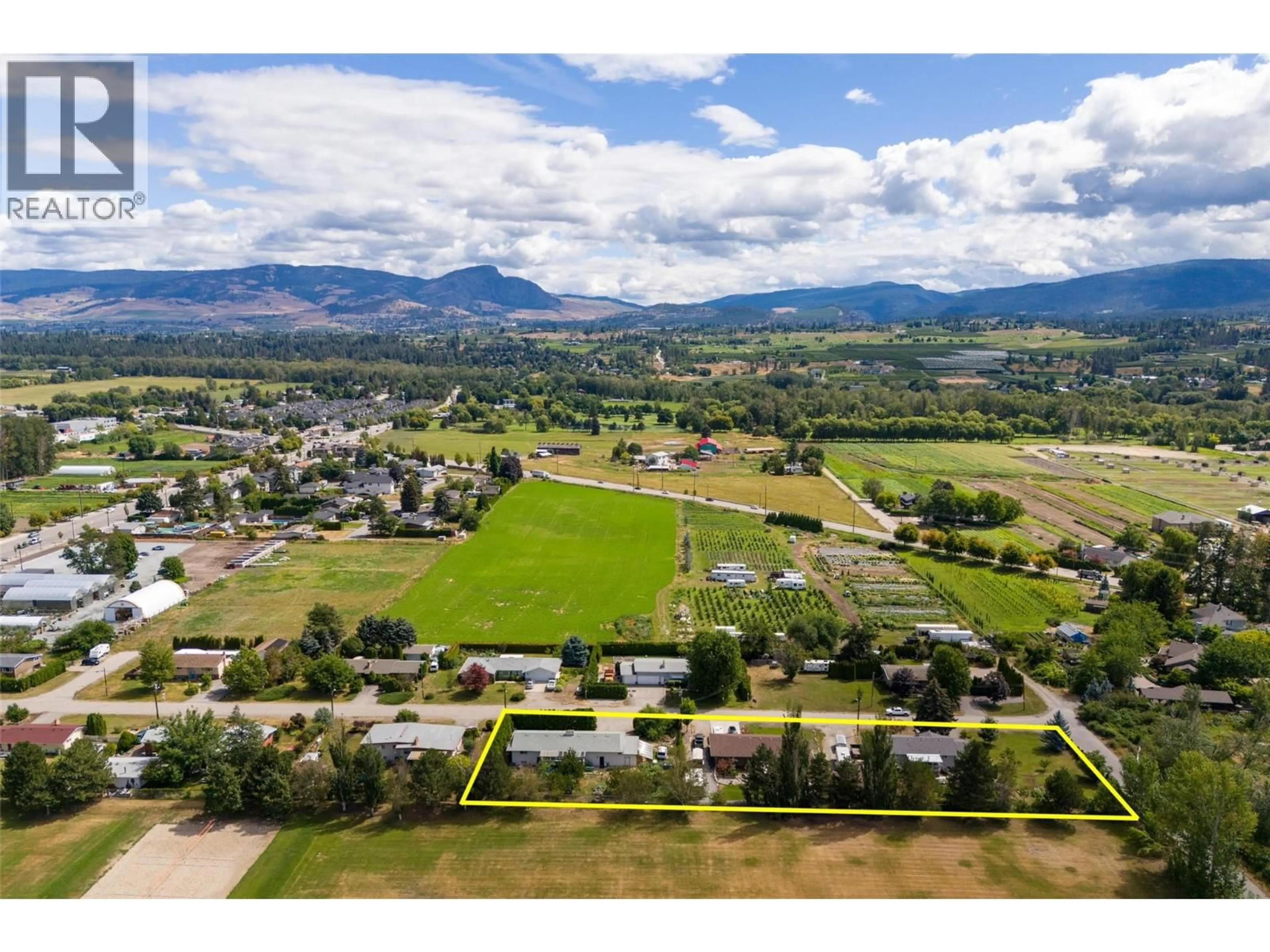 A pic from outside/outdoor area/front of a property/back of a property/a pic from drone, mountain view for 3250 ST. AMAND ROAD, Kelowna British Columbia V1W3P1