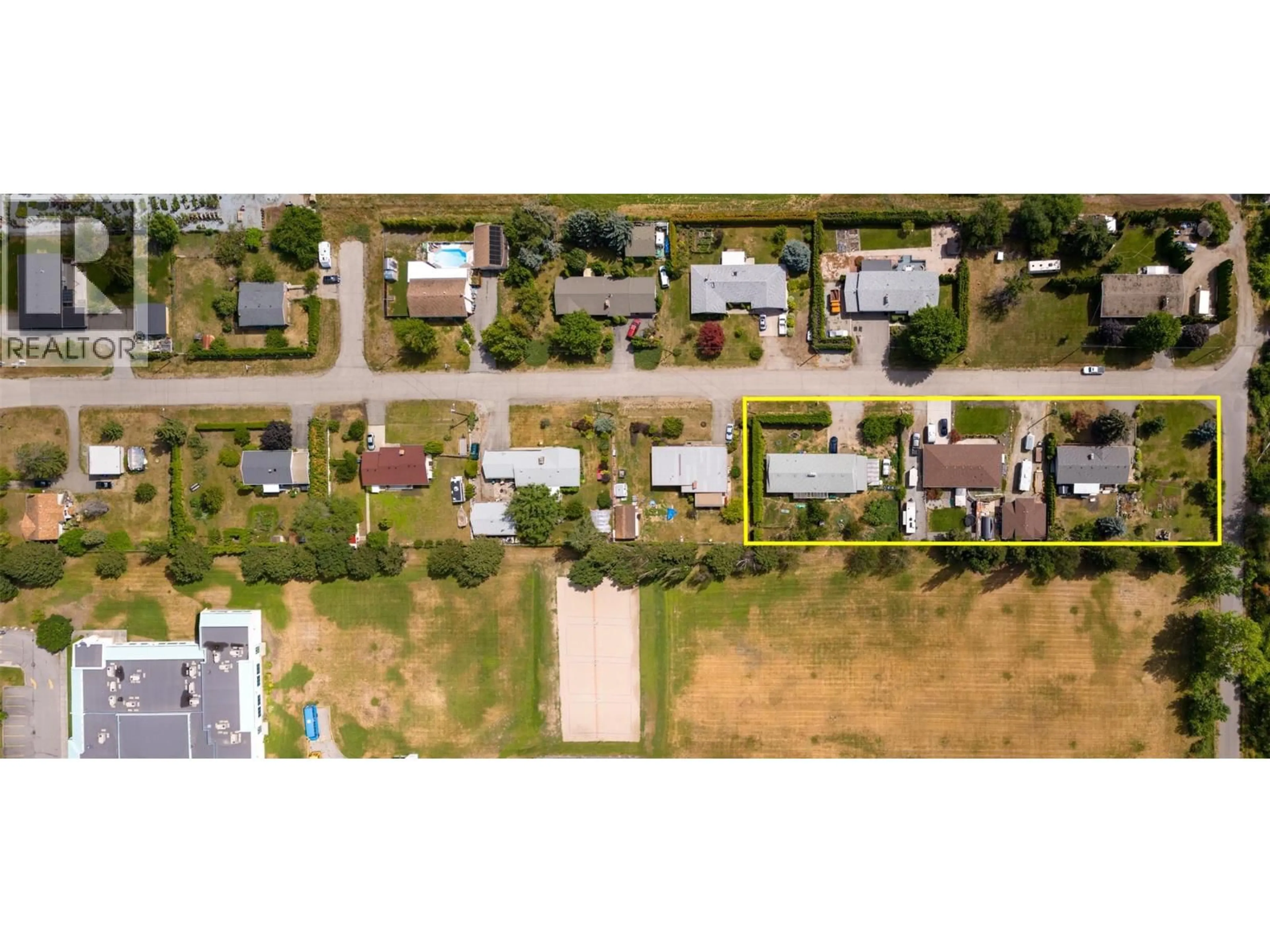 A pic from outside/outdoor area/front of a property/back of a property/a pic from drone, street for 3250 ST. AMAND ROAD, Kelowna British Columbia V1W3P1