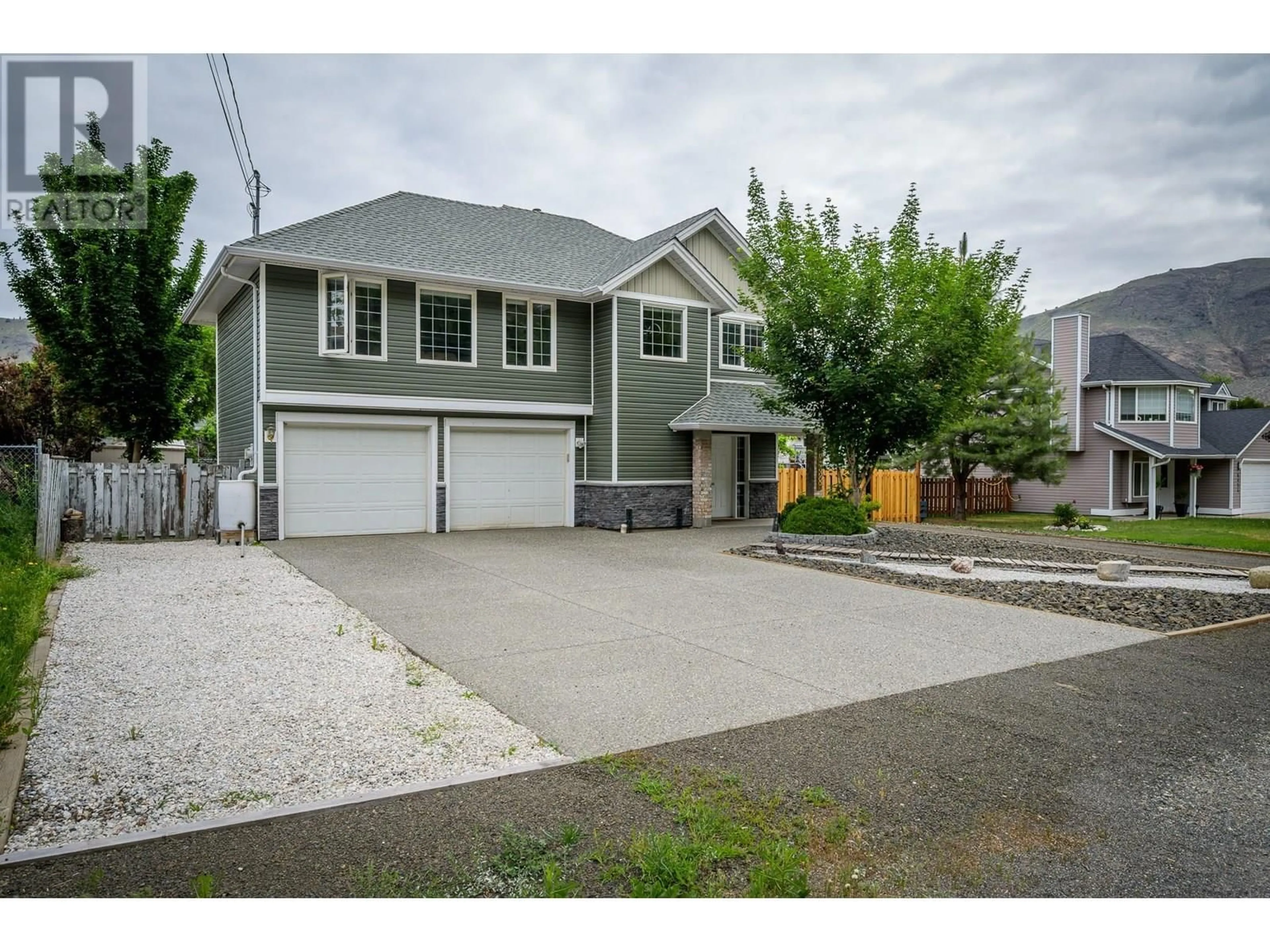 Home with vinyl exterior material, street for 6438 DALLAS DRIVE, Kamloops British Columbia V2C4X5
