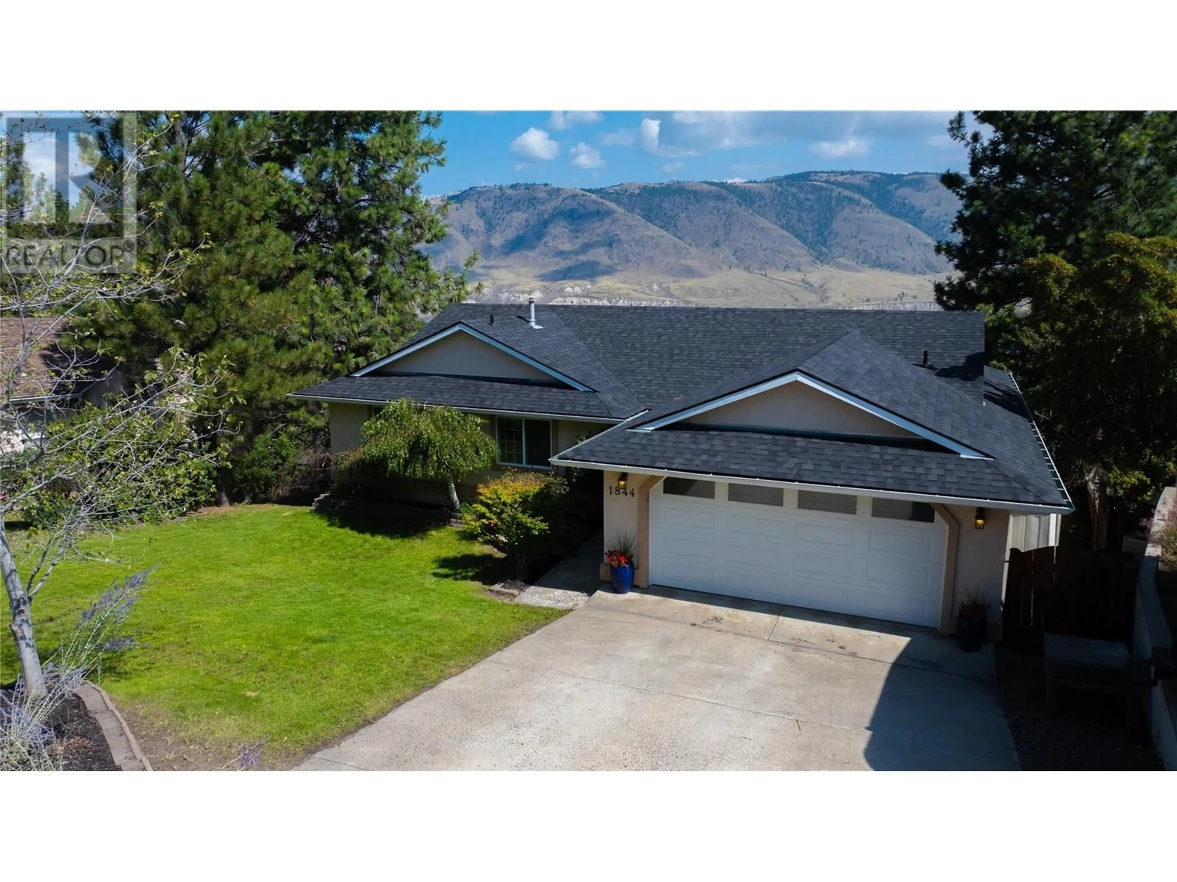 A pic from outside/outdoor area/front of a property/back of a property/a pic from drone, mountain view for 1844 COLDWATER DRIVE, Kamloops British Columbia V2E2R3