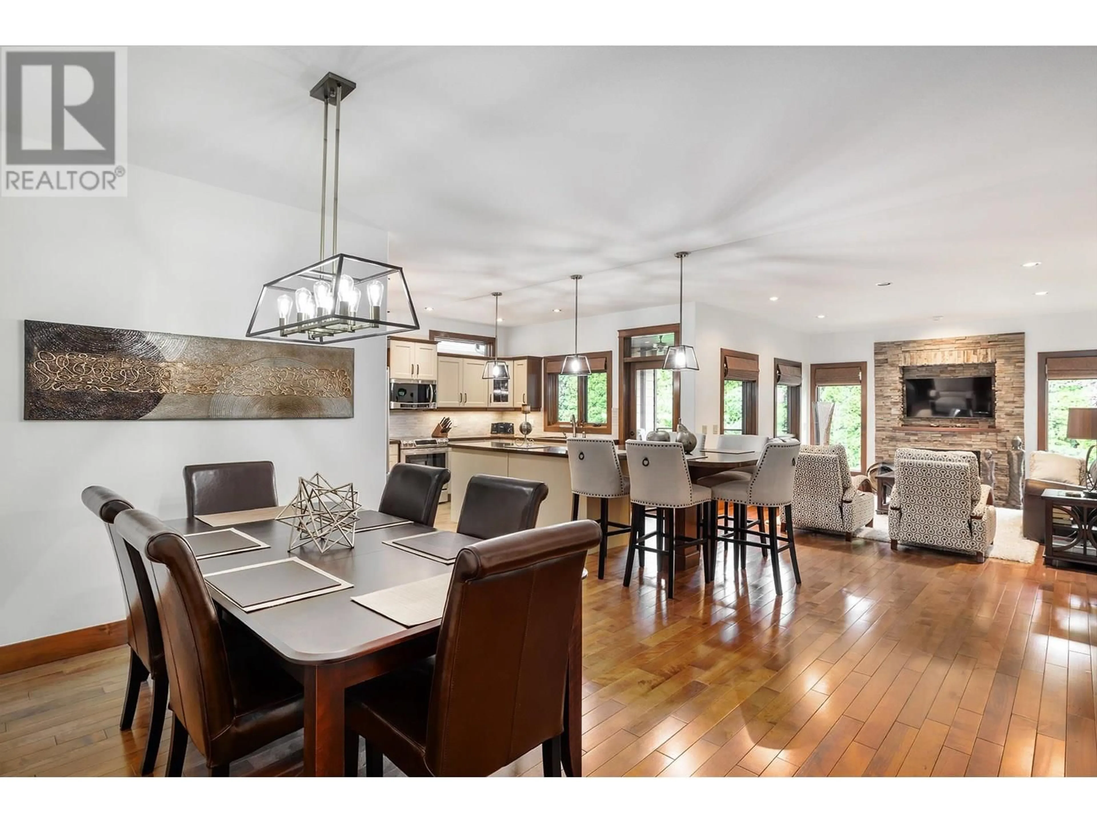 Open concept kitchen, wood/laminate floor for 137 - 4450 GORDON DRIVE, Kelowna British Columbia V1W1T1