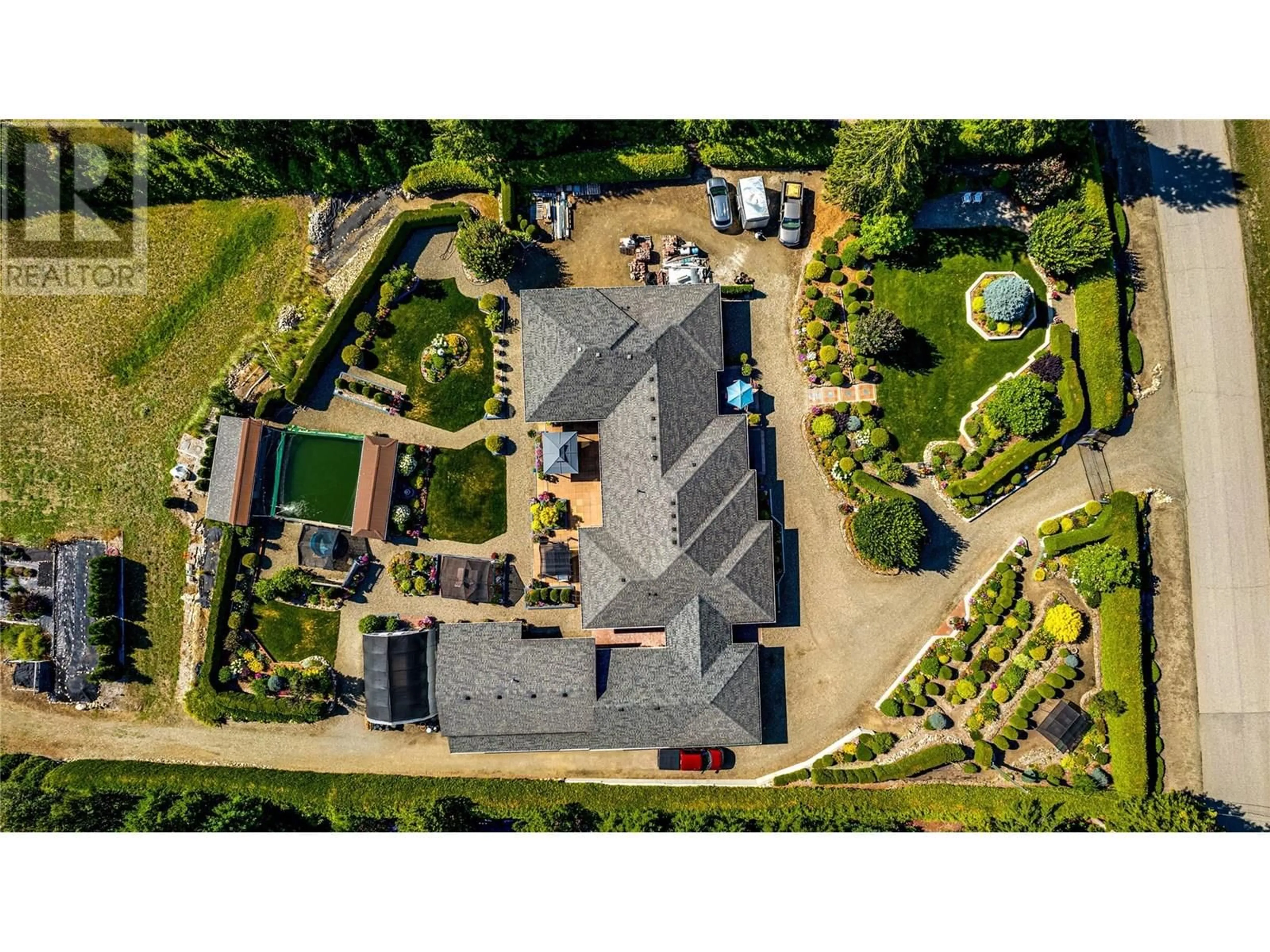 A pic from outside/outdoor area/front of a property/back of a property/a pic from drone, building for 39 LADYSLIPPER ROAD, Lumby British Columbia V0E2G5