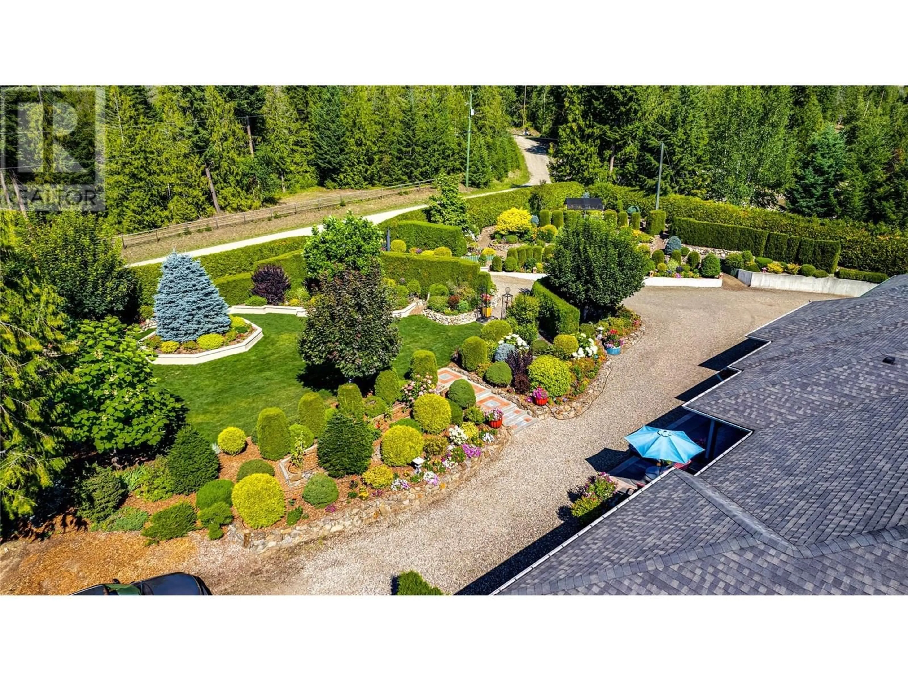 A pic from outside/outdoor area/front of a property/back of a property/a pic from drone, unknown for 39 LADYSLIPPER ROAD, Lumby British Columbia V0E2G5