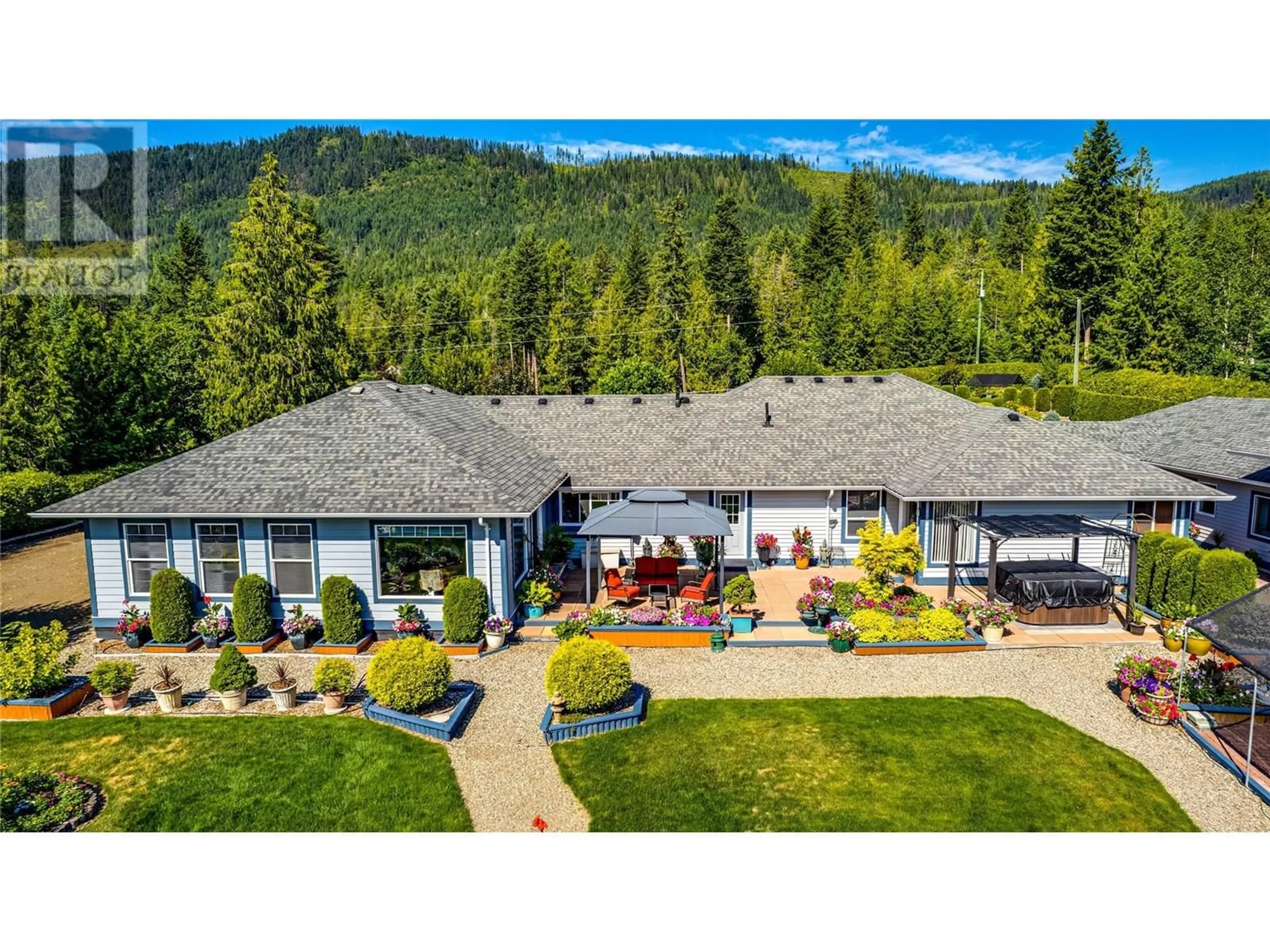 A pic from outside/outdoor area/front of a property/back of a property/a pic from drone, mountain view for 39 LADYSLIPPER ROAD, Lumby British Columbia V0E2G5