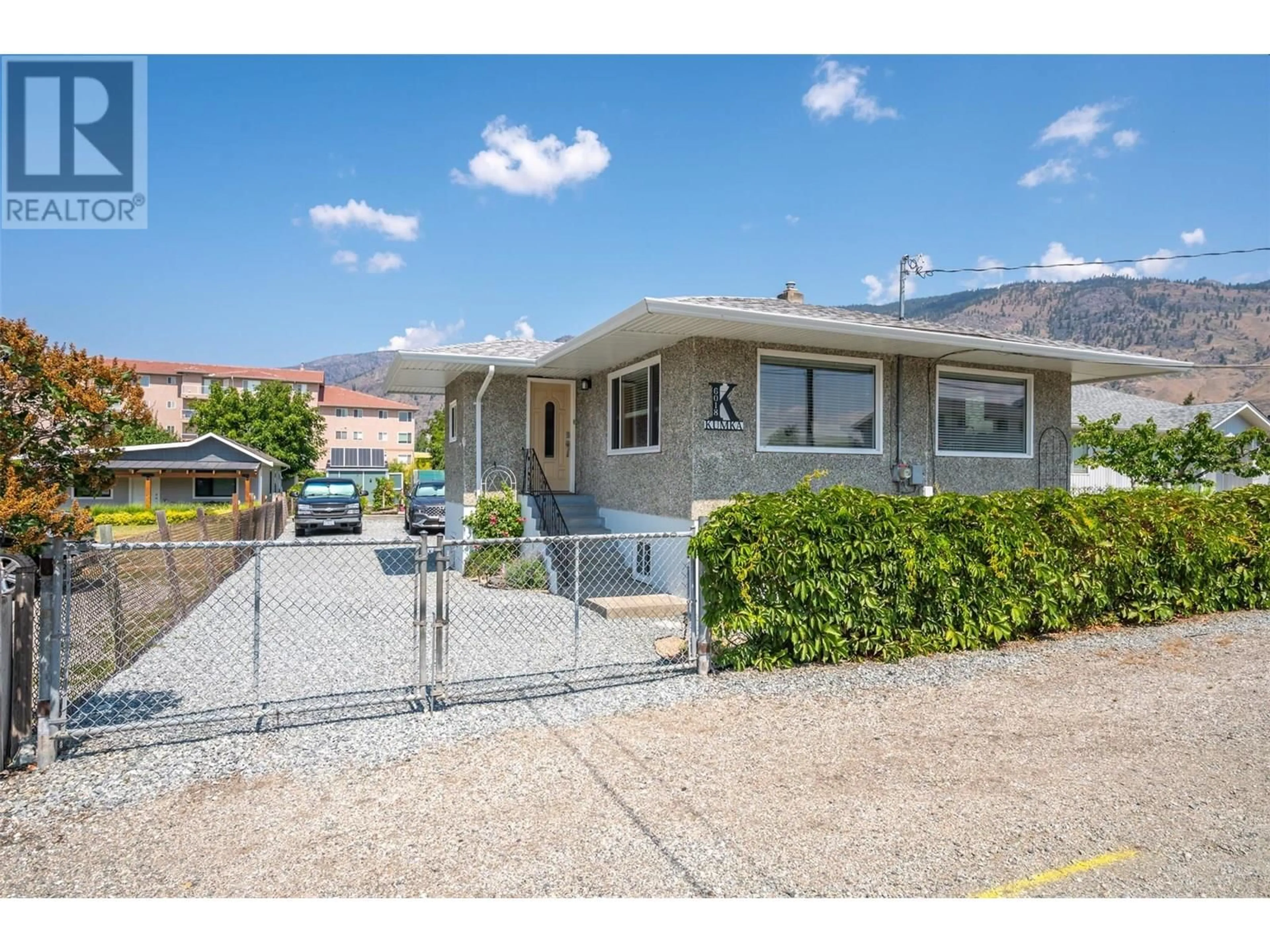Home with vinyl exterior material, mountain view for 6018 MAPLE DRIVE, Osoyoos British Columbia V0H1V3