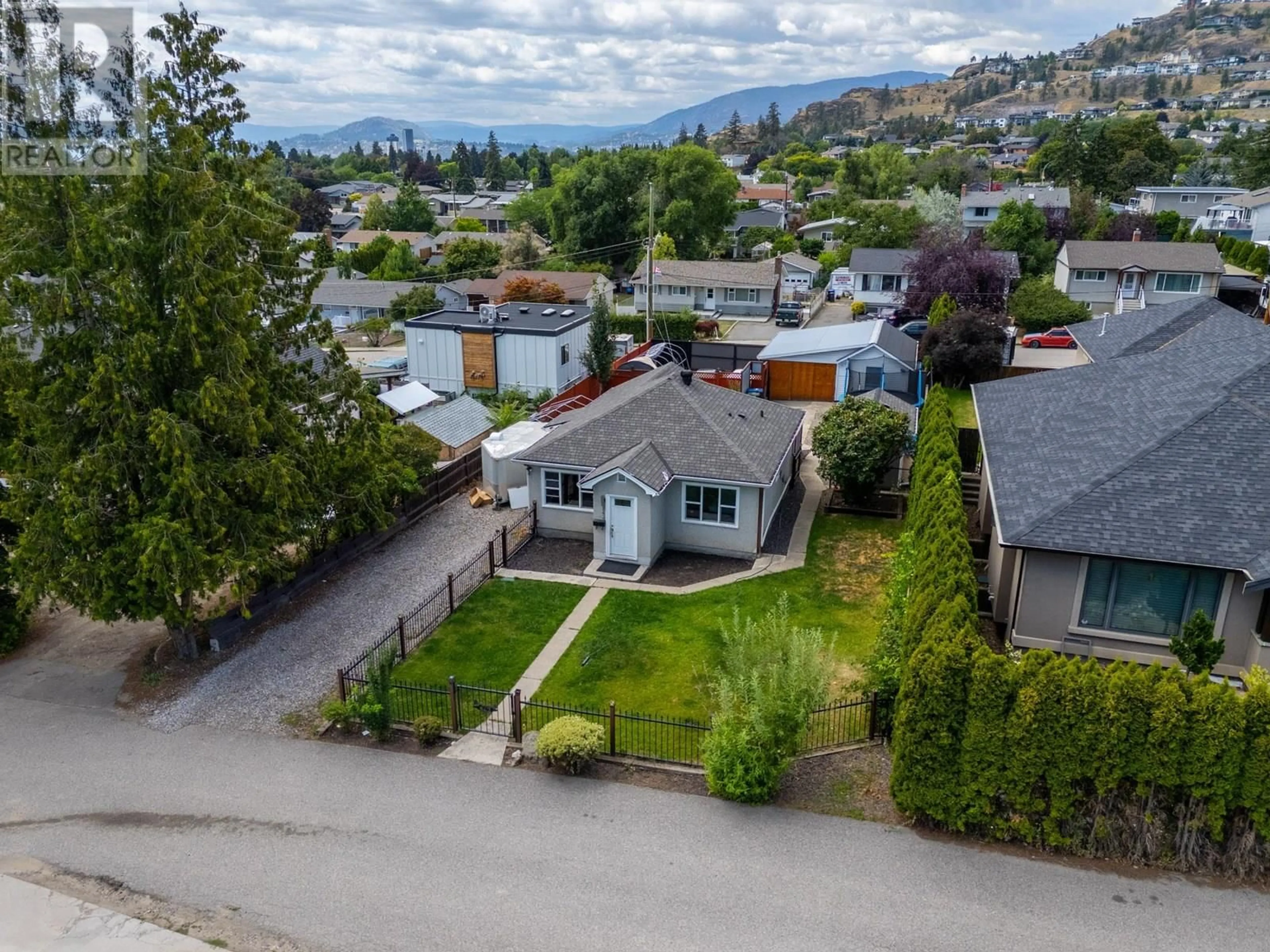 A pic from outside/outdoor area/front of a property/back of a property/a pic from drone, mountain view for 842 GLENMORE DRIVE, Kelowna British Columbia V1Y4N9