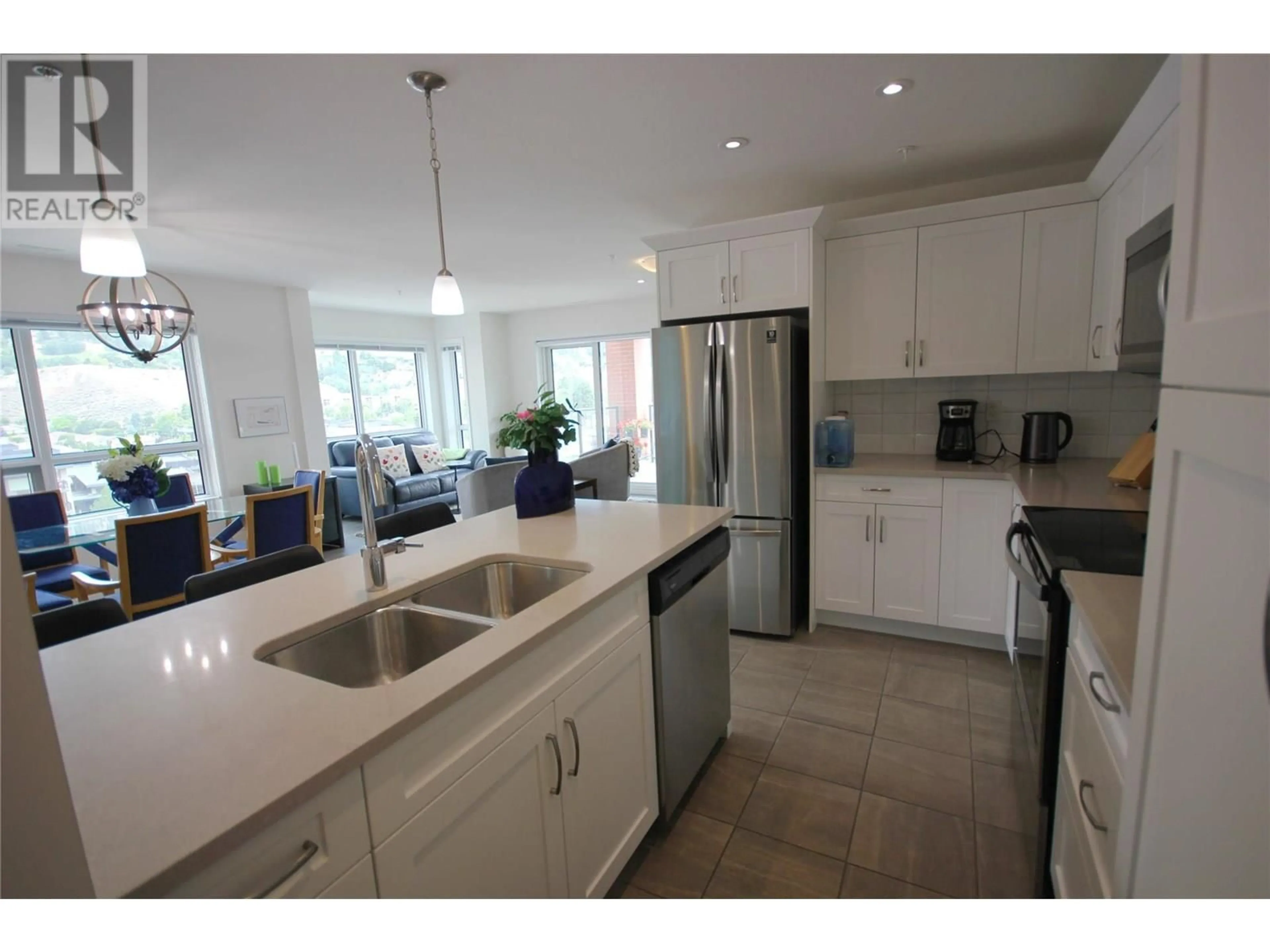 Open concept kitchen, ceramic/tile floor for 707 - 3388 SKAHA LAKE ROAD, Penticton British Columbia V2A6G4