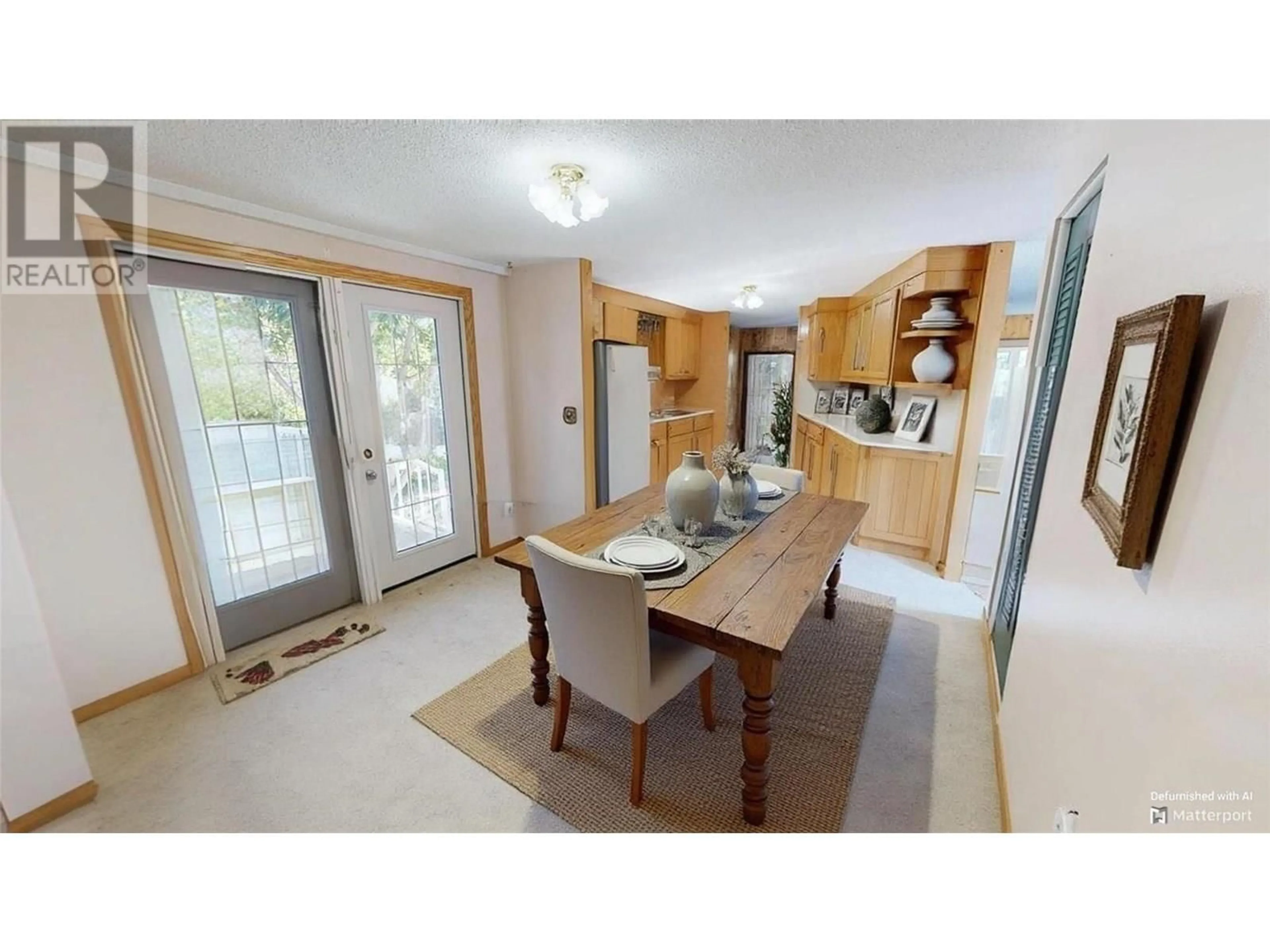 Dining room, wood/laminate floor for 7516 COLUMBIA AVENUE, Radium Hot Springs British Columbia V0A1M0