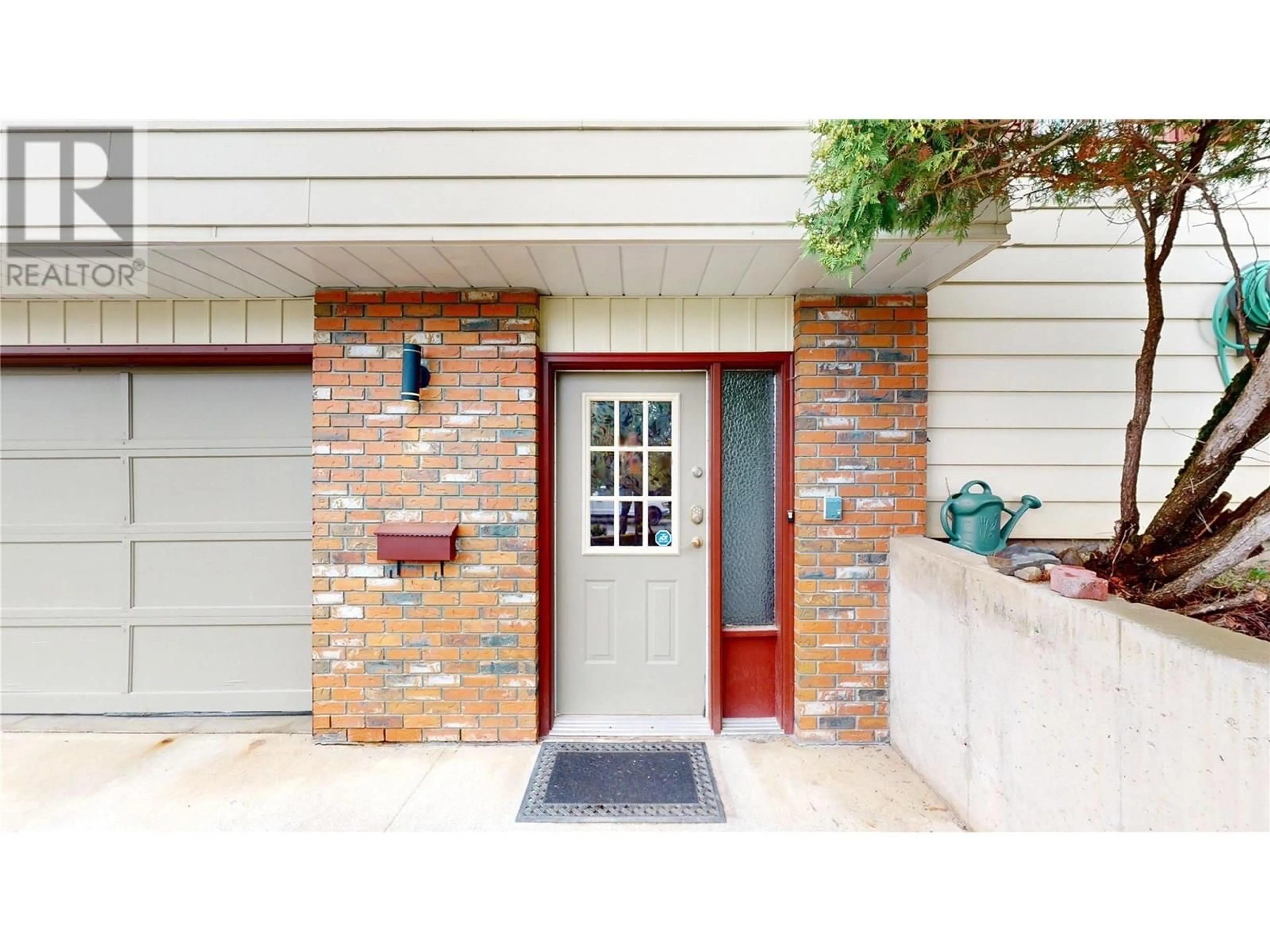 Home with brick exterior material, street for 705 15TH STREET SOUTH, Cranbrook British Columbia V1C5N9