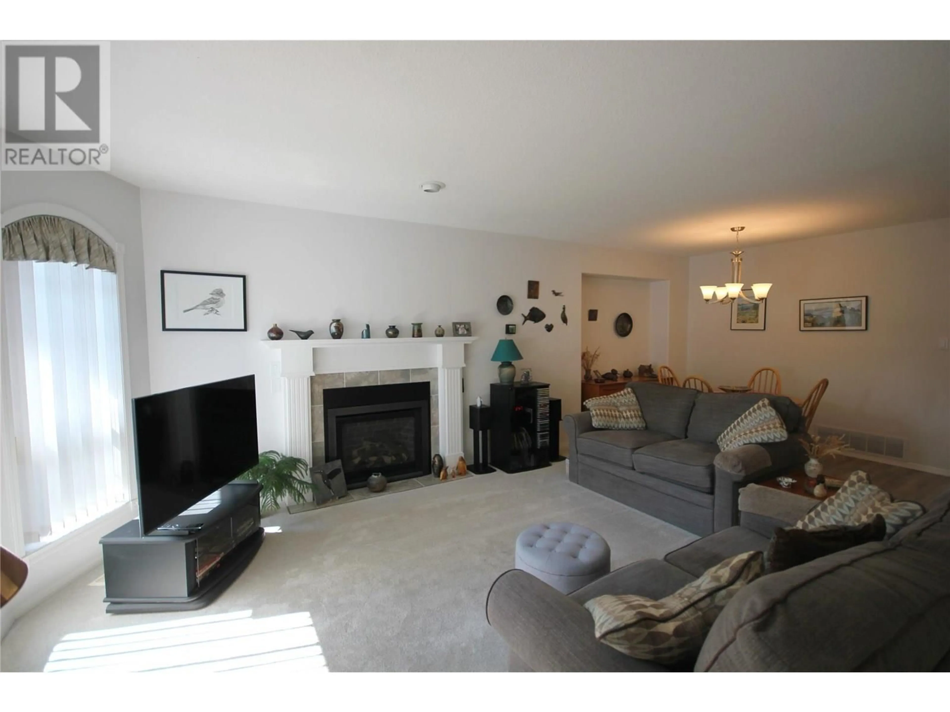 Living room with furniture, unknown for 105 - 1634 CARMI AVENUE, Penticton British Columbia V2A8K5