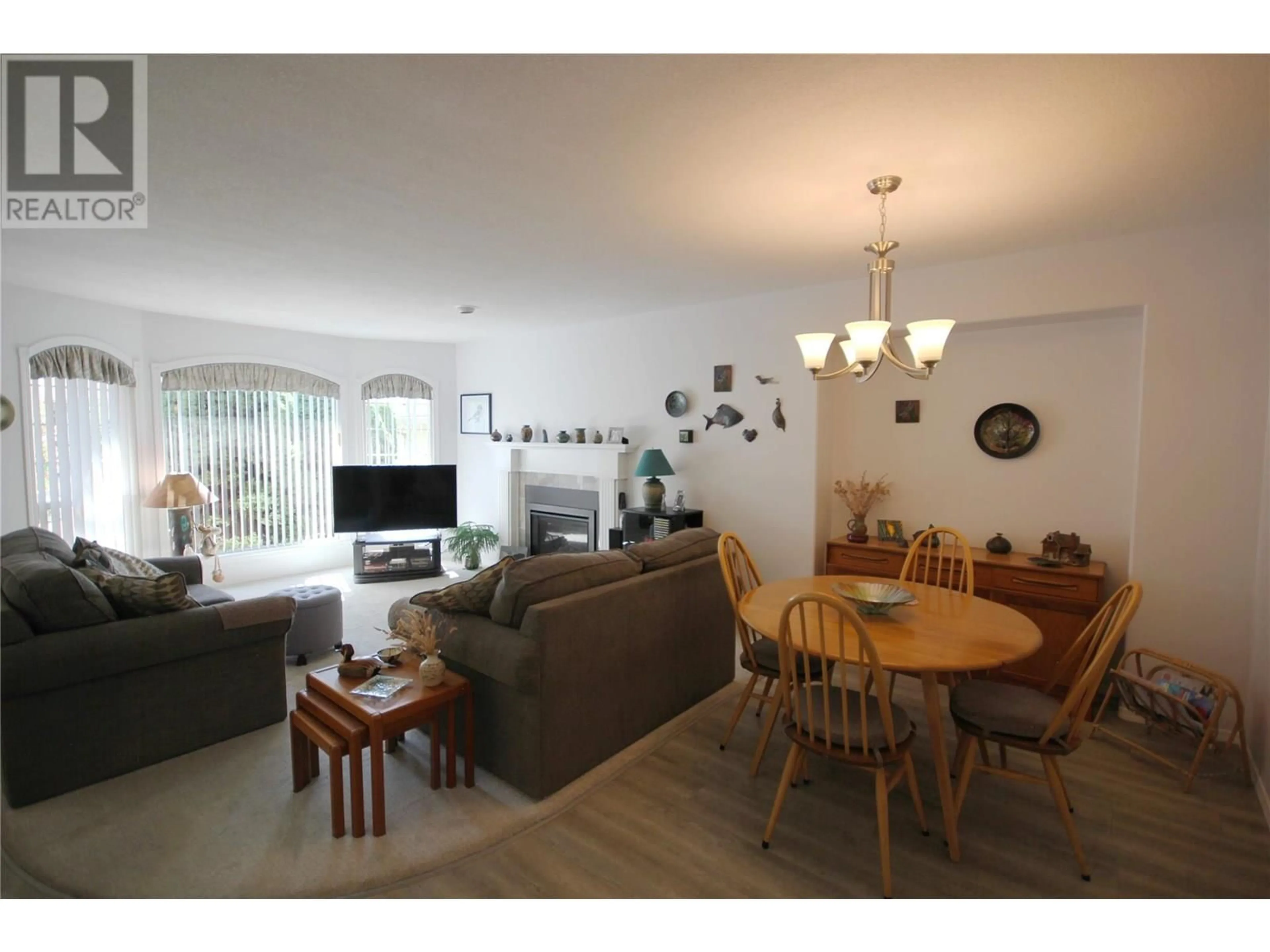 Living room with furniture, unknown for 105 - 1634 CARMI AVENUE, Penticton British Columbia V2A8K5