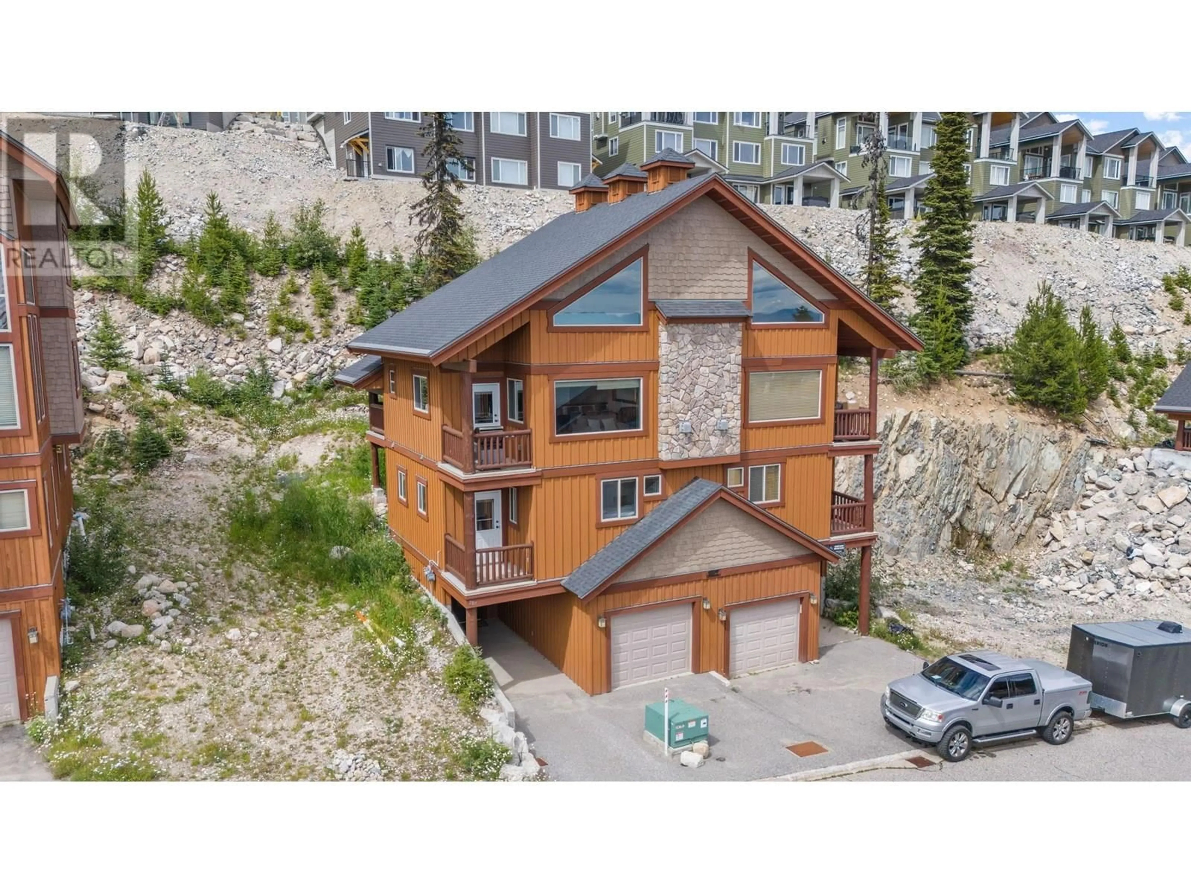 A pic from outside/outdoor area/front of a property/back of a property/a pic from drone, building for 70B FOREST LANE, Big White British Columbia V1P1P3