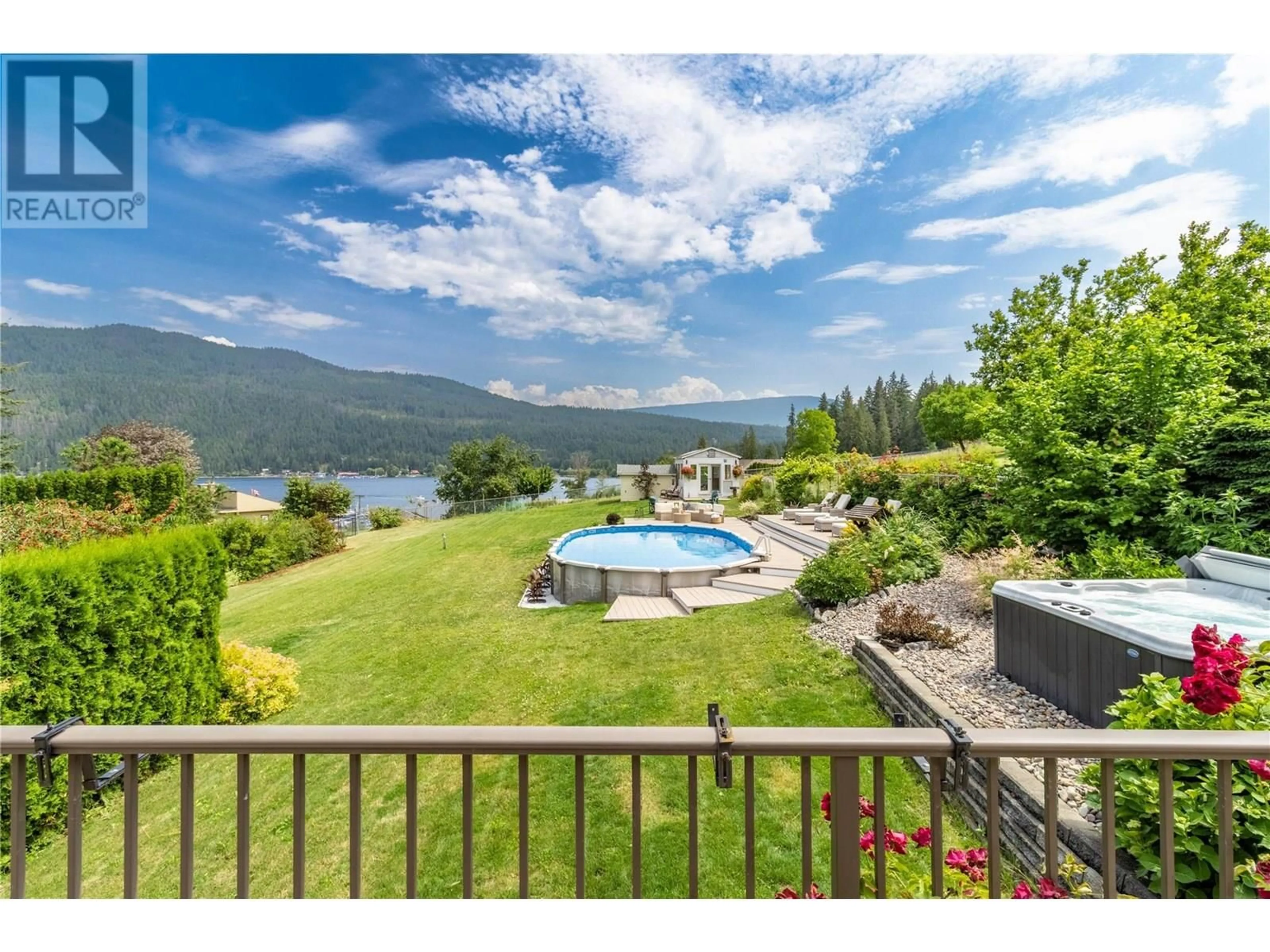 A pic from outside/outdoor area/front of a property/back of a property/a pic from drone, water/lake/river/ocean view for 2484 SUNRISE BOULEVARD, Blind Bay British Columbia V0E2W2