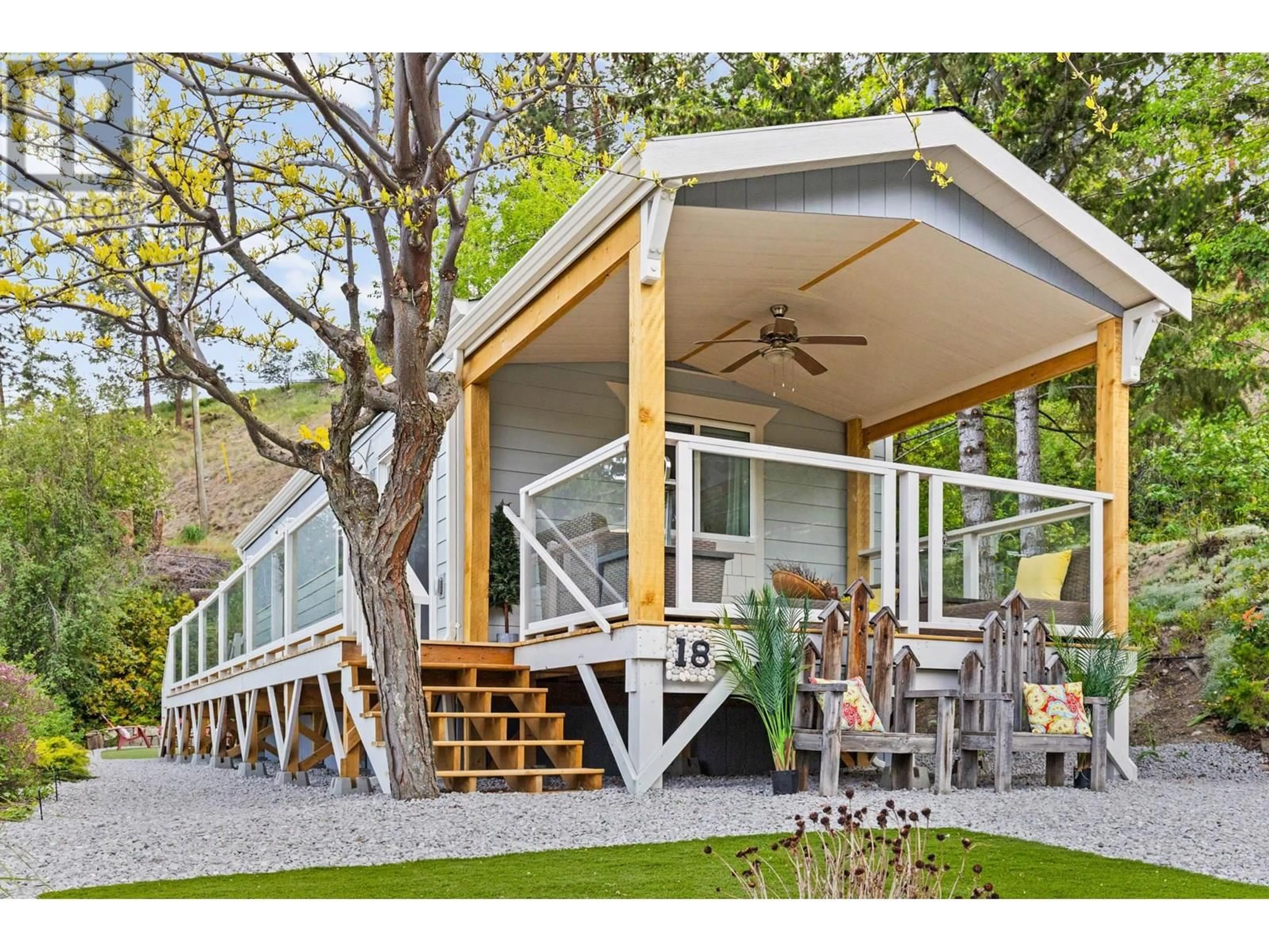 Home with vinyl exterior material, street for 18 - 6711 HIGHWAY 97 OTHER SOUTH, Peachland British Columbia V0H1X9