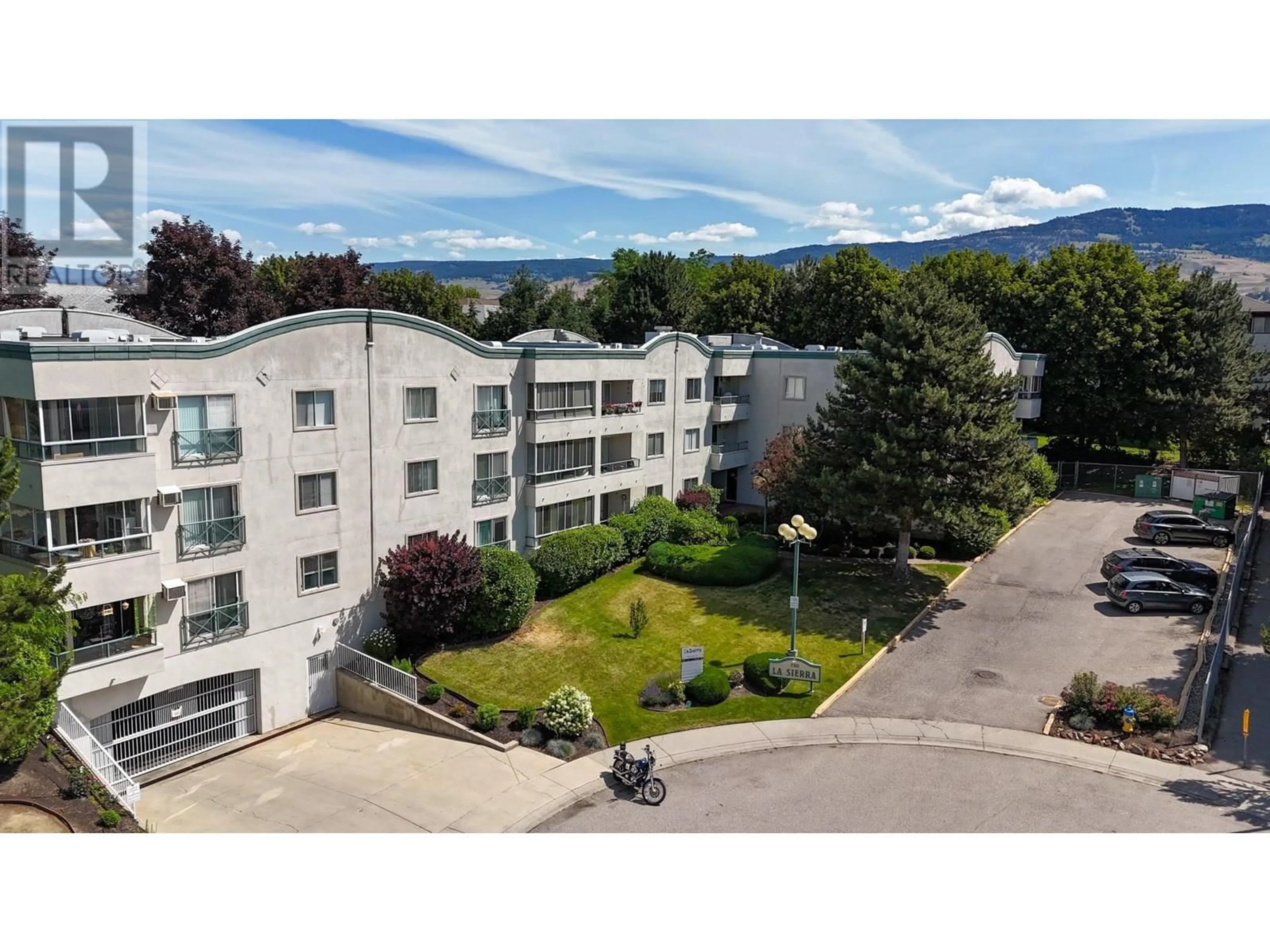 A pic from outside/outdoor area/front of a property/back of a property/a pic from drone, mountain view for 211 - 730 BADKE ROAD, Kelowna British Columbia V1X6G9