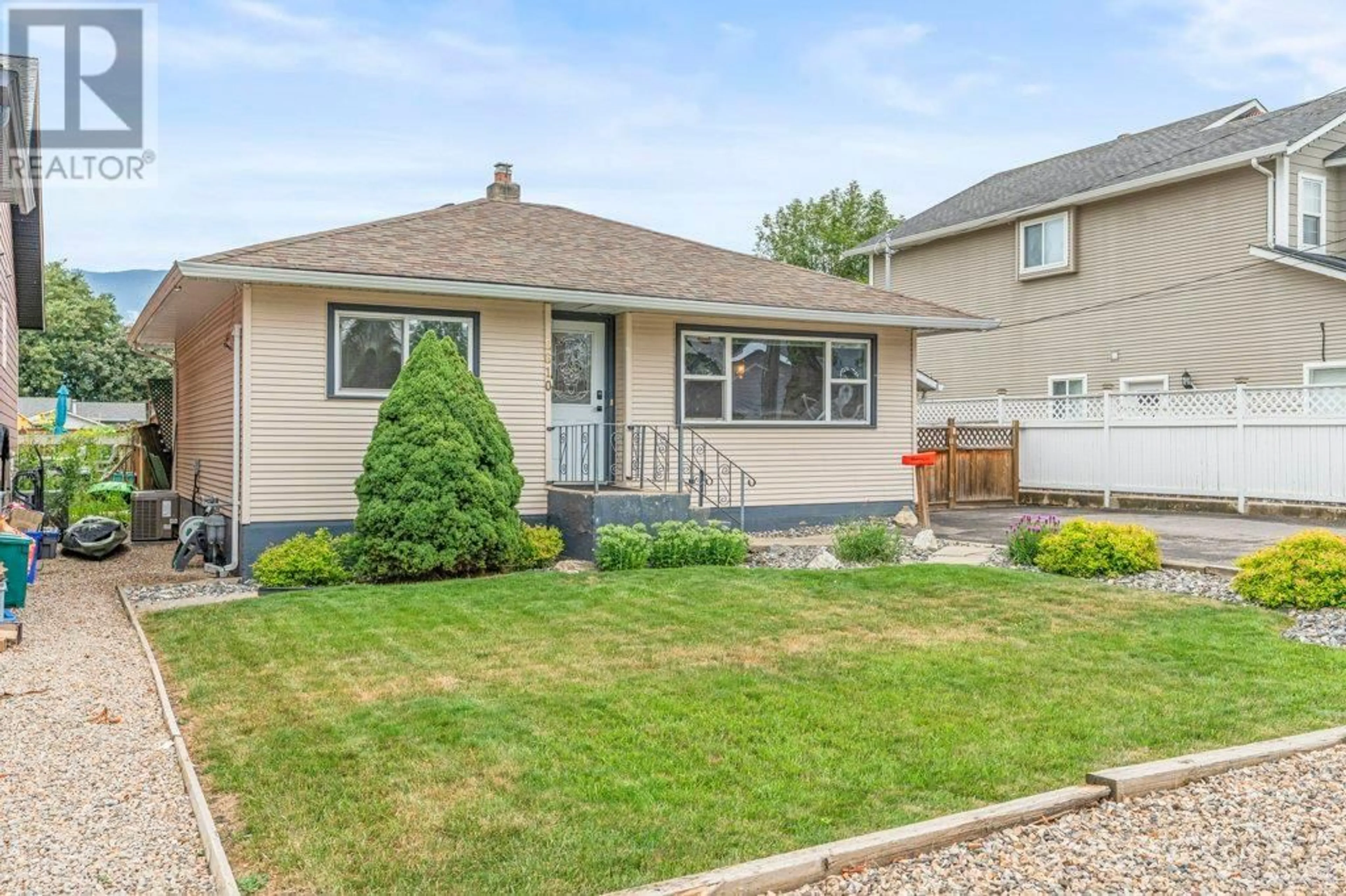 Home with vinyl exterior material, street for 2610 COLONY STREET, Armstrong British Columbia V0E1B2